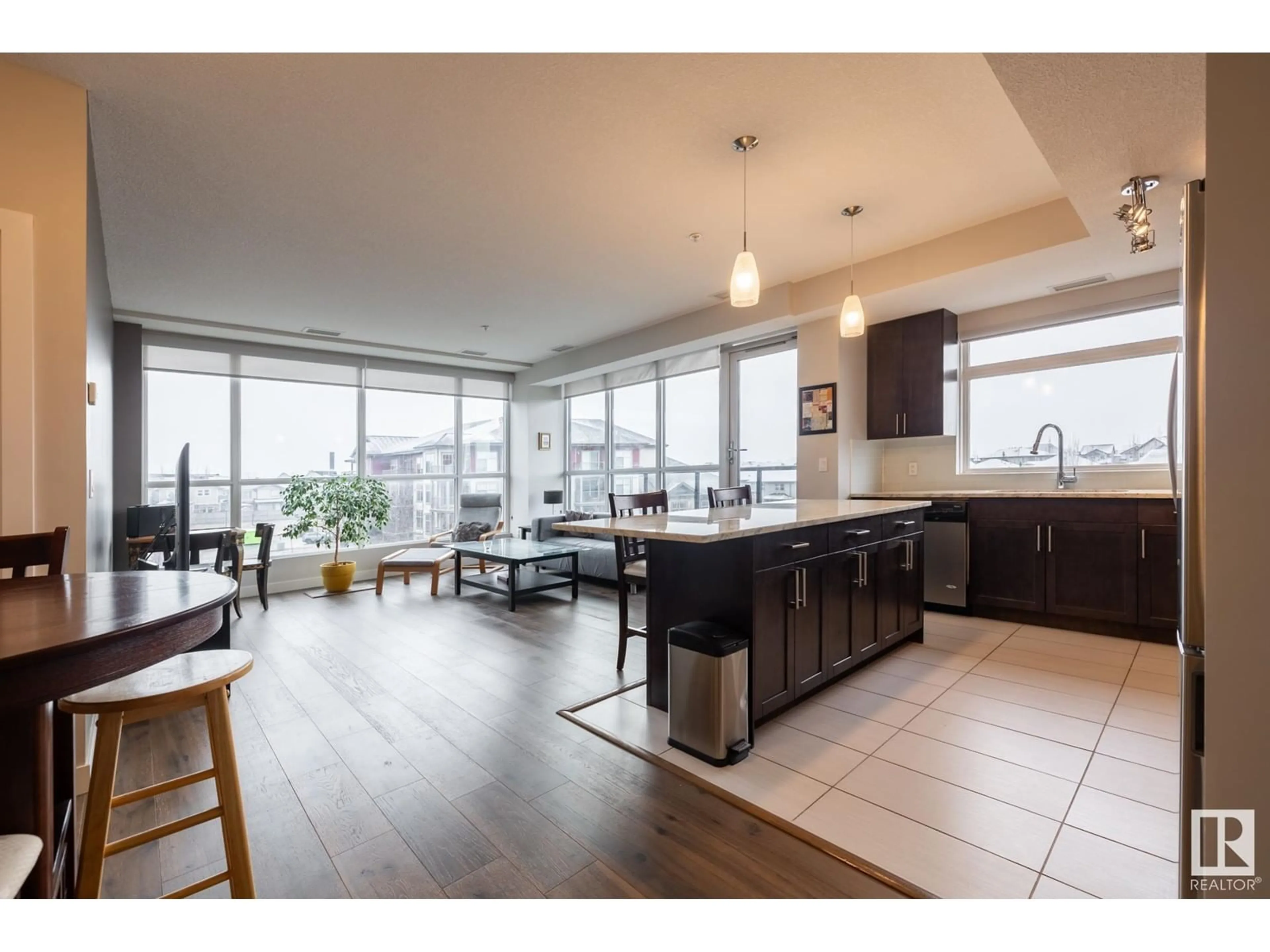 Open concept kitchen for #308 5151 WINDERMERE BV SW, Edmonton Alberta T6W2K4