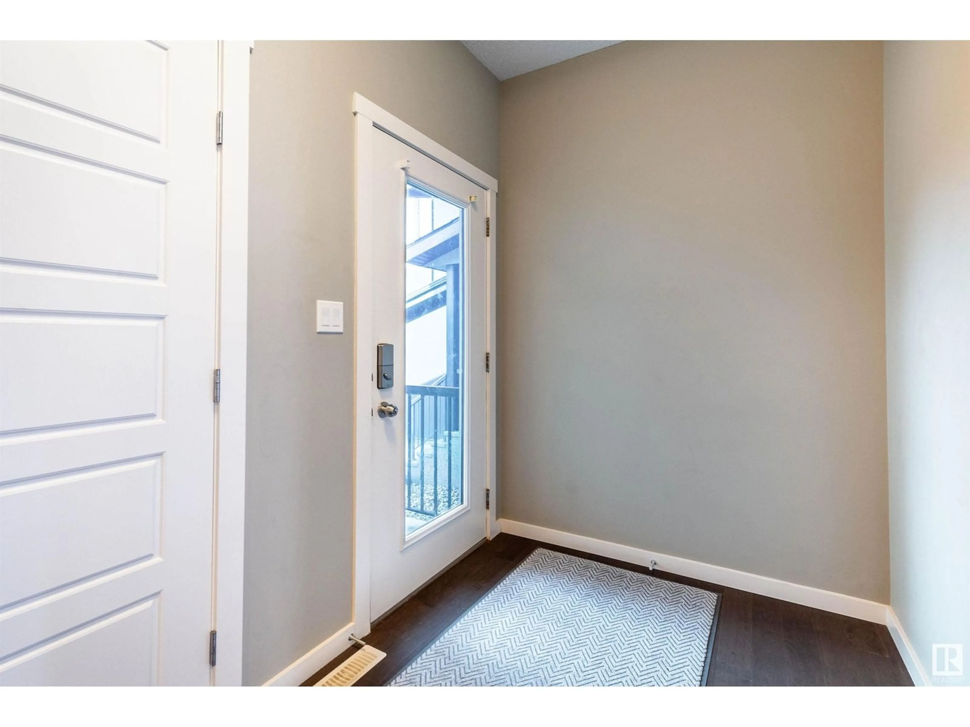 Indoor entryway, wood floors for 2921 KOSTASH DR SW, Edmonton Alberta T6W3J8