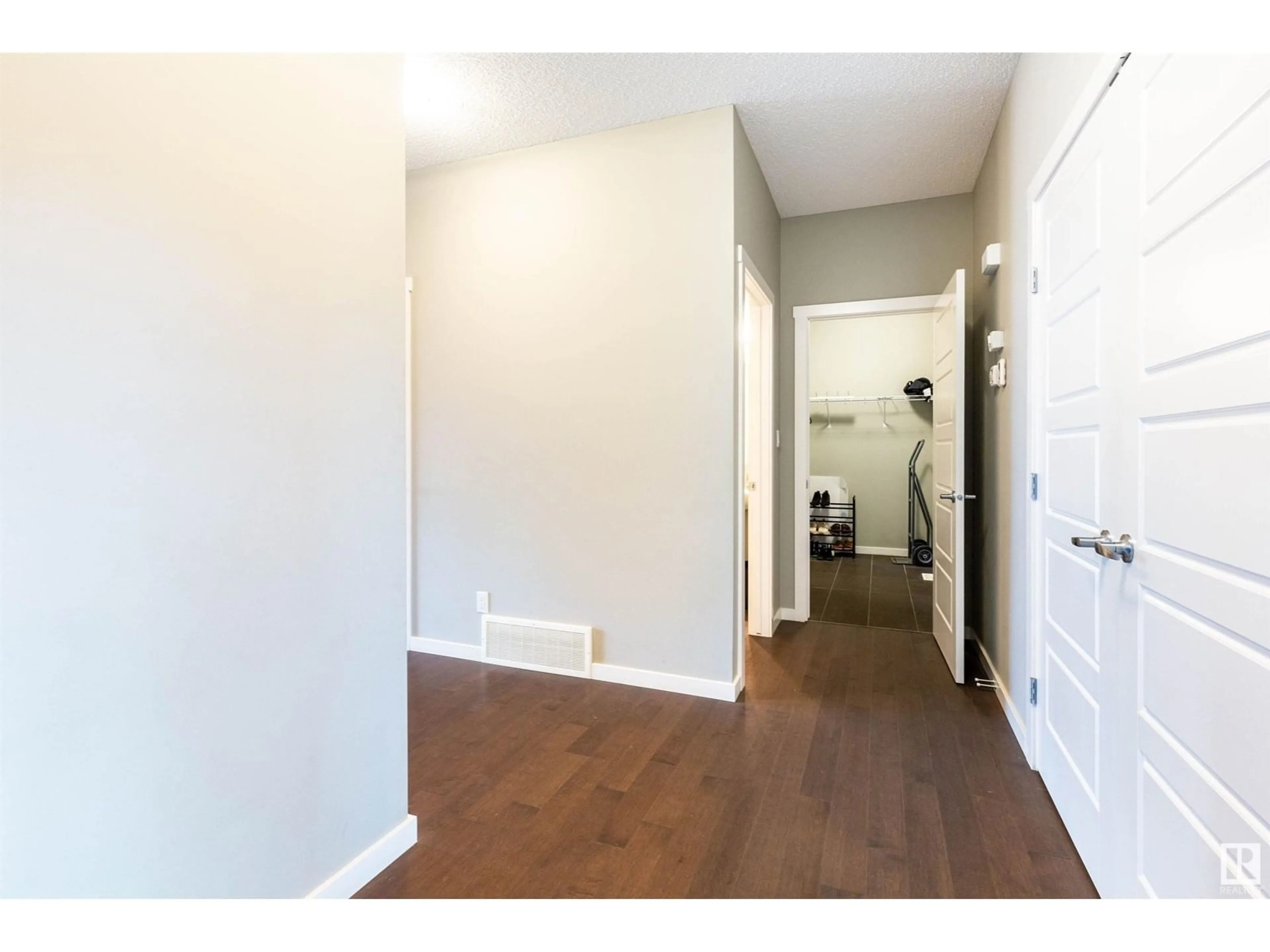 Indoor entryway, wood floors for 2921 KOSTASH DR SW, Edmonton Alberta T6W3J8