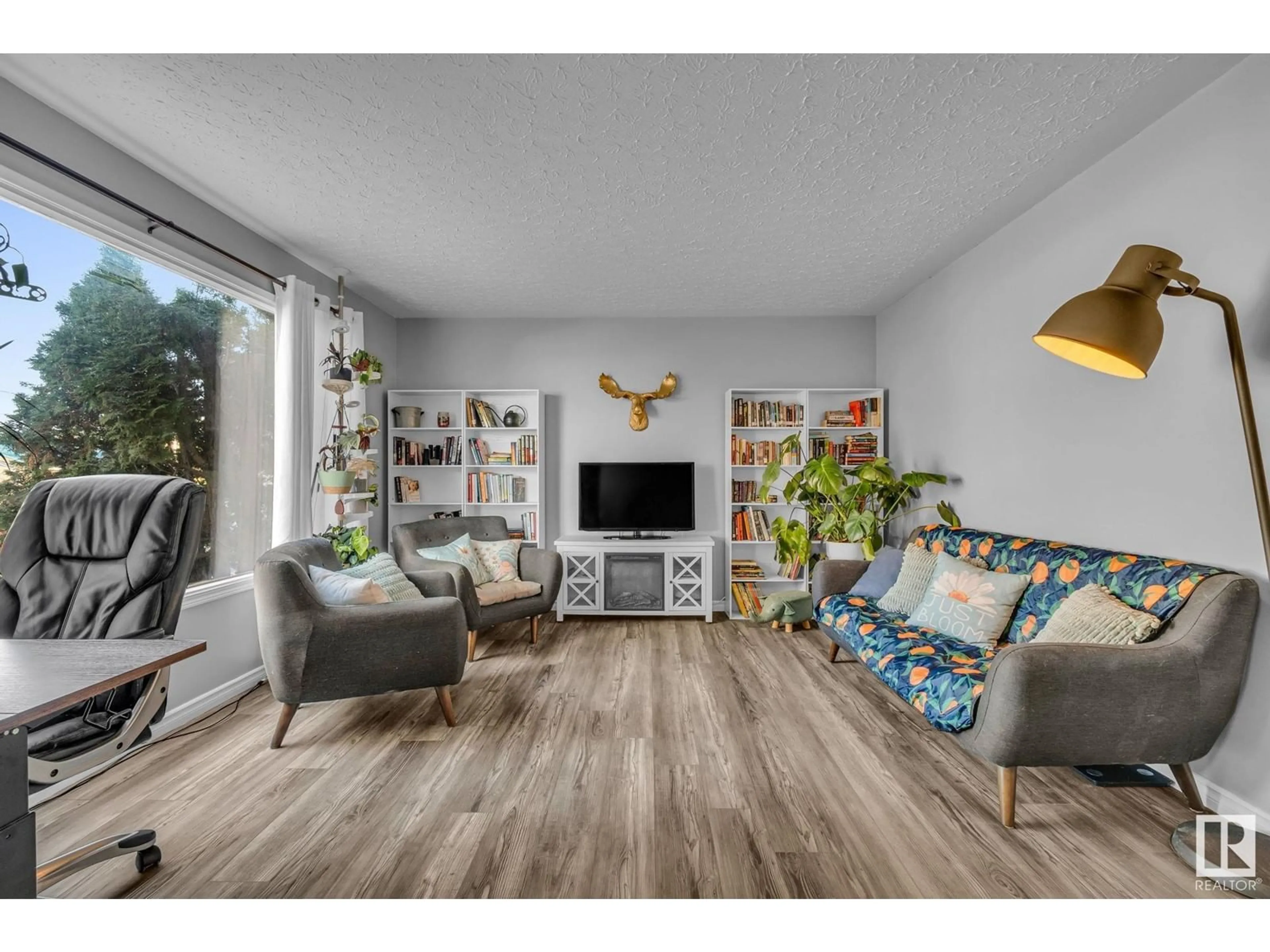 Living room, wood floors for 13026 123 ST NW, Edmonton Alberta T5L0J7