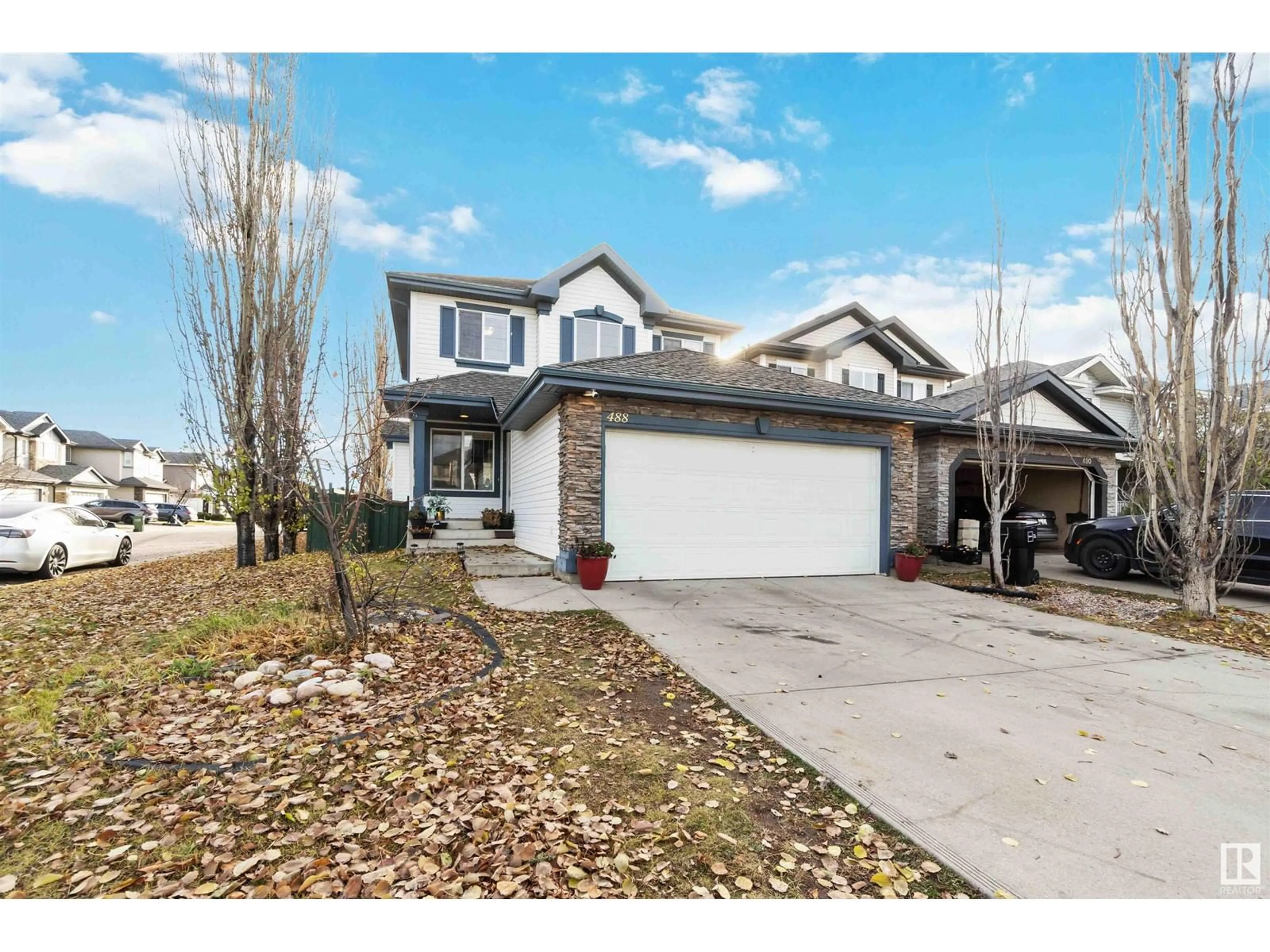 Frontside or backside of a home, the street view for 488 HUNTERS GREEN GR NW, Edmonton Alberta T6R3L3