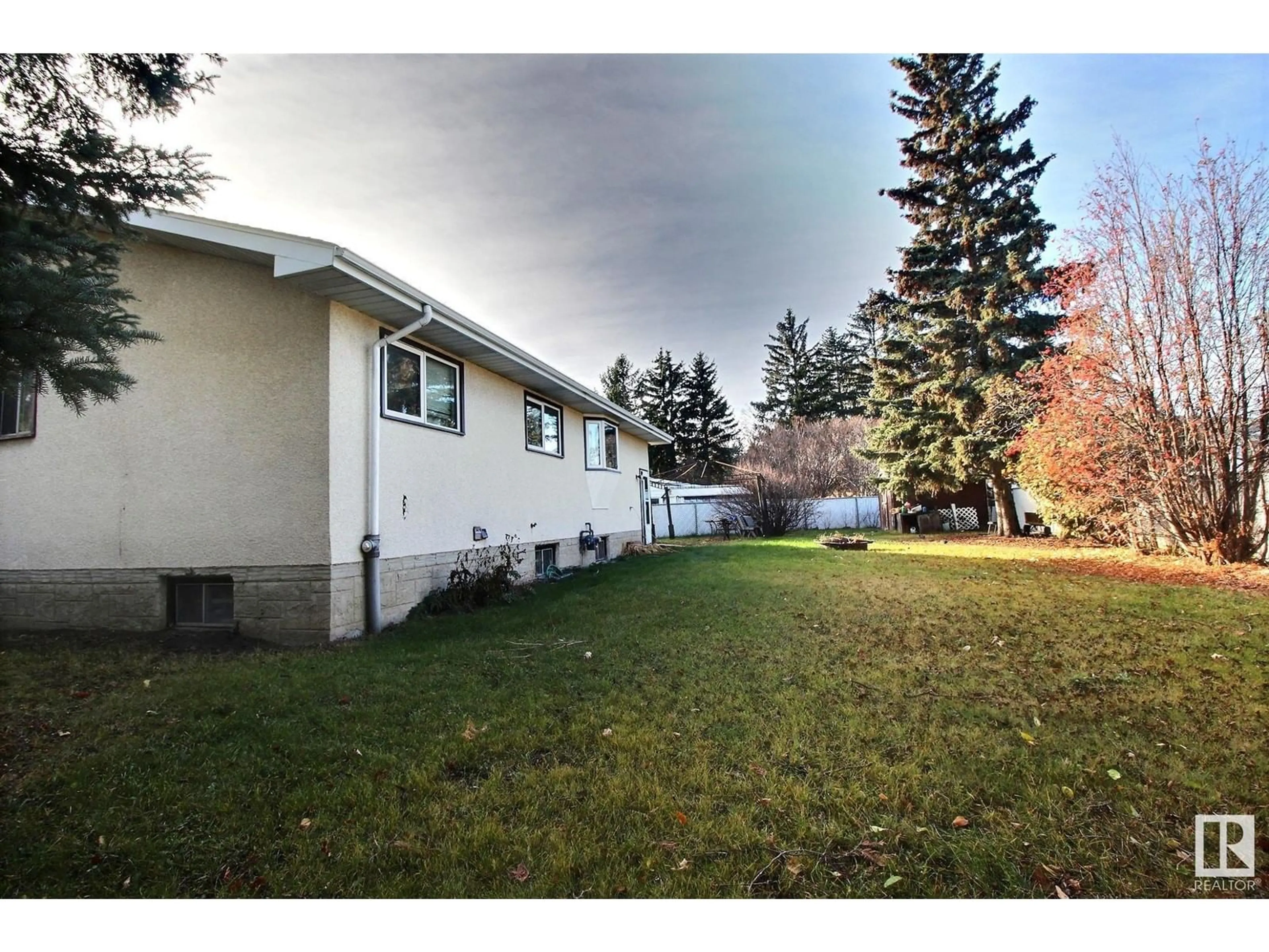 Frontside or backside of a home, the fenced backyard for 319 LEE RIDGE RD NW, Edmonton Alberta T6K0N5