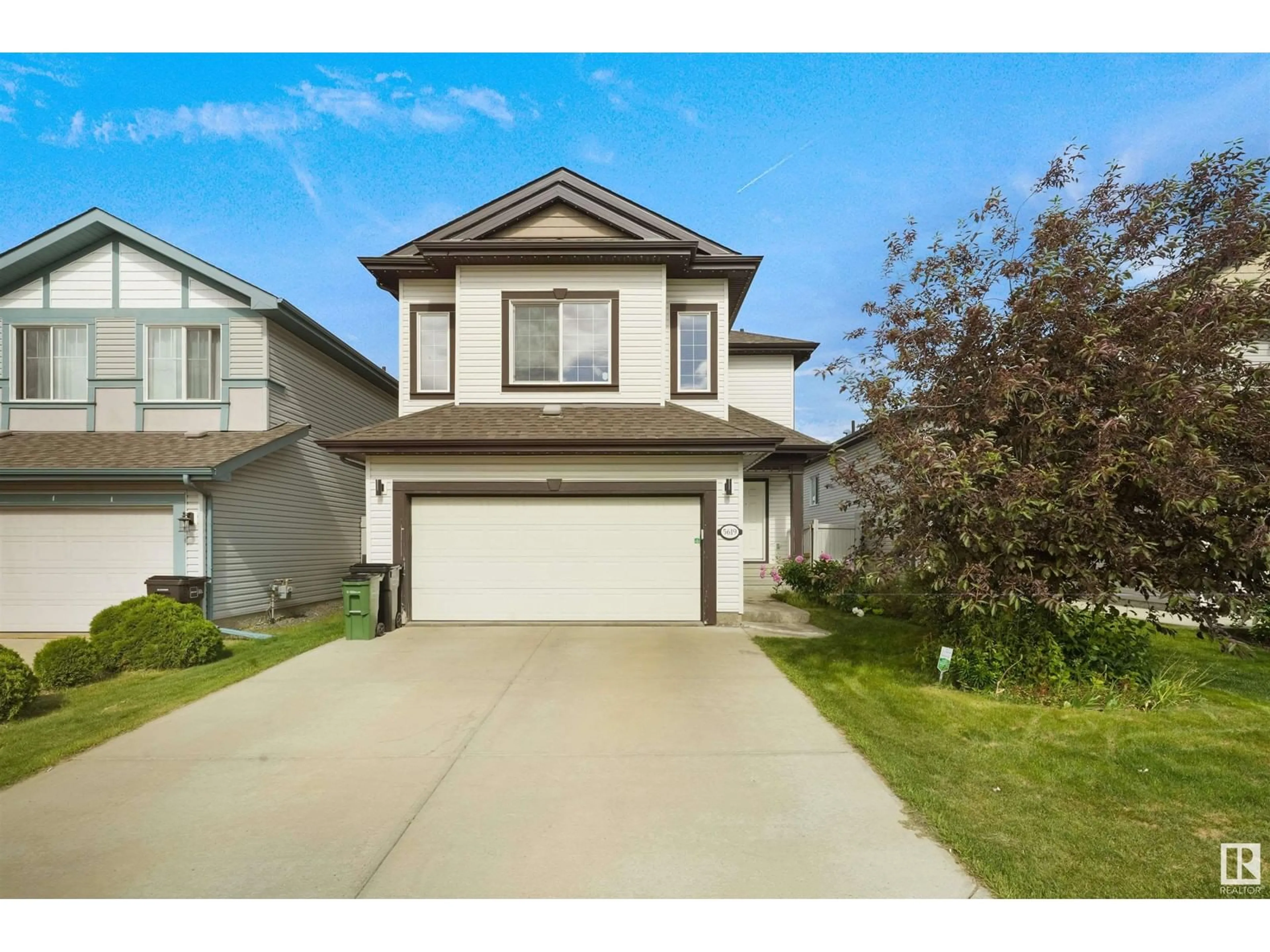 Frontside or backside of a home, the street view for 5619 209 ST NW, Edmonton Alberta T6M0E9