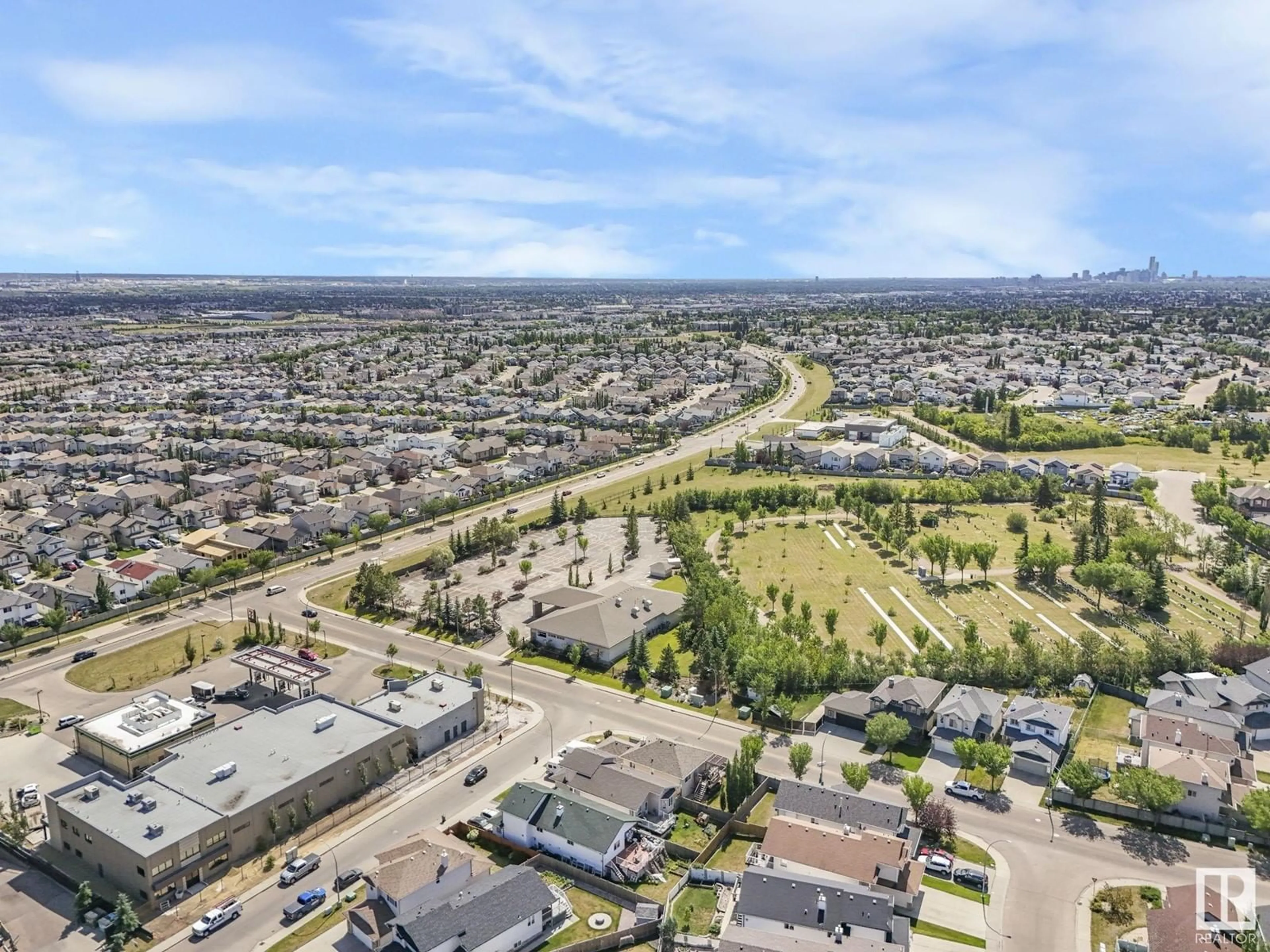 A pic from exterior of the house or condo, the view of city buildings for #303 16235 51 ST NW NW, Edmonton Alberta T5Y3C7