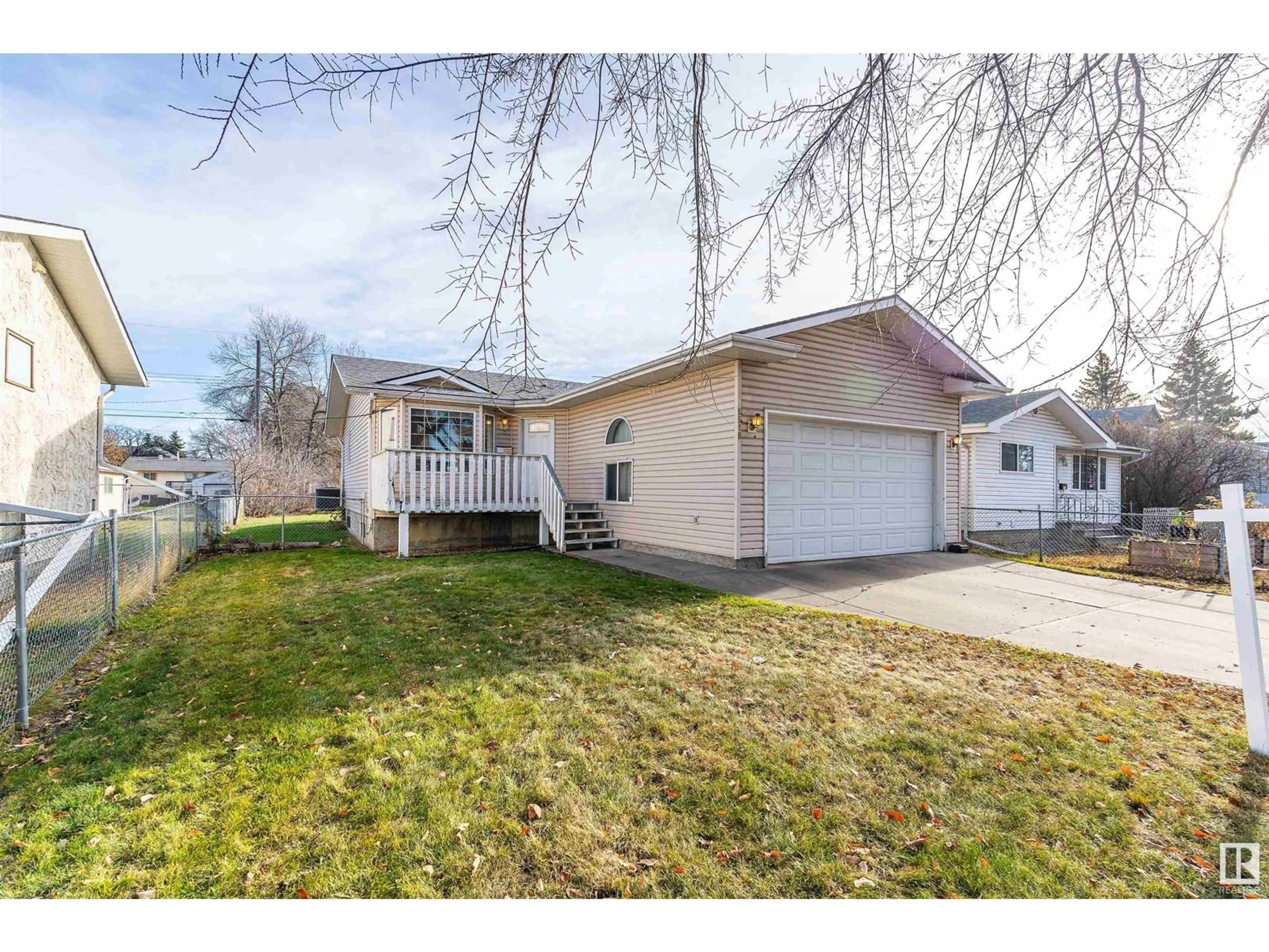 Frontside or backside of a home, the fenced backyard for 9519 155 ST NW, Edmonton Alberta T5P2K3