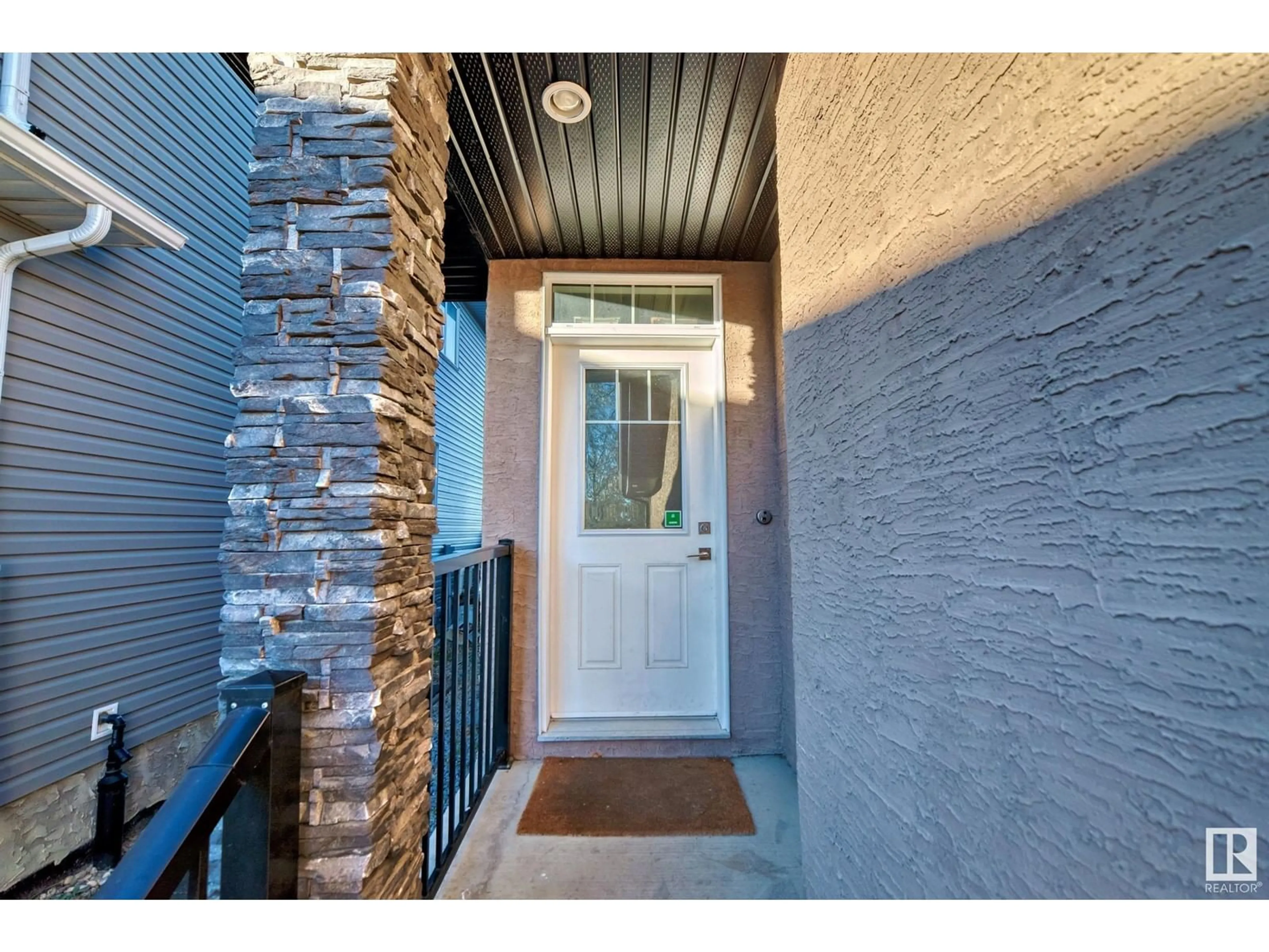 Indoor entryway, wood floors for 2406 22 AV NW, Edmonton Alberta T6T0Y4