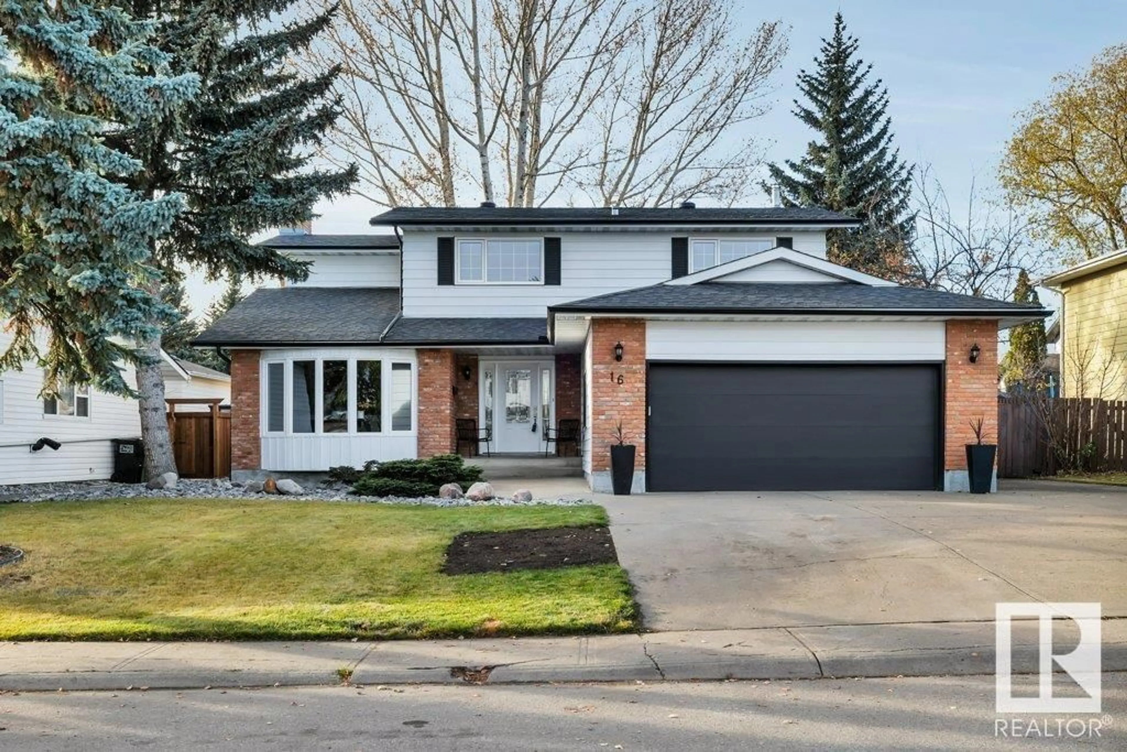 Home with brick exterior material for 16 Westridge CR NW, Edmonton Alberta T5T1C6