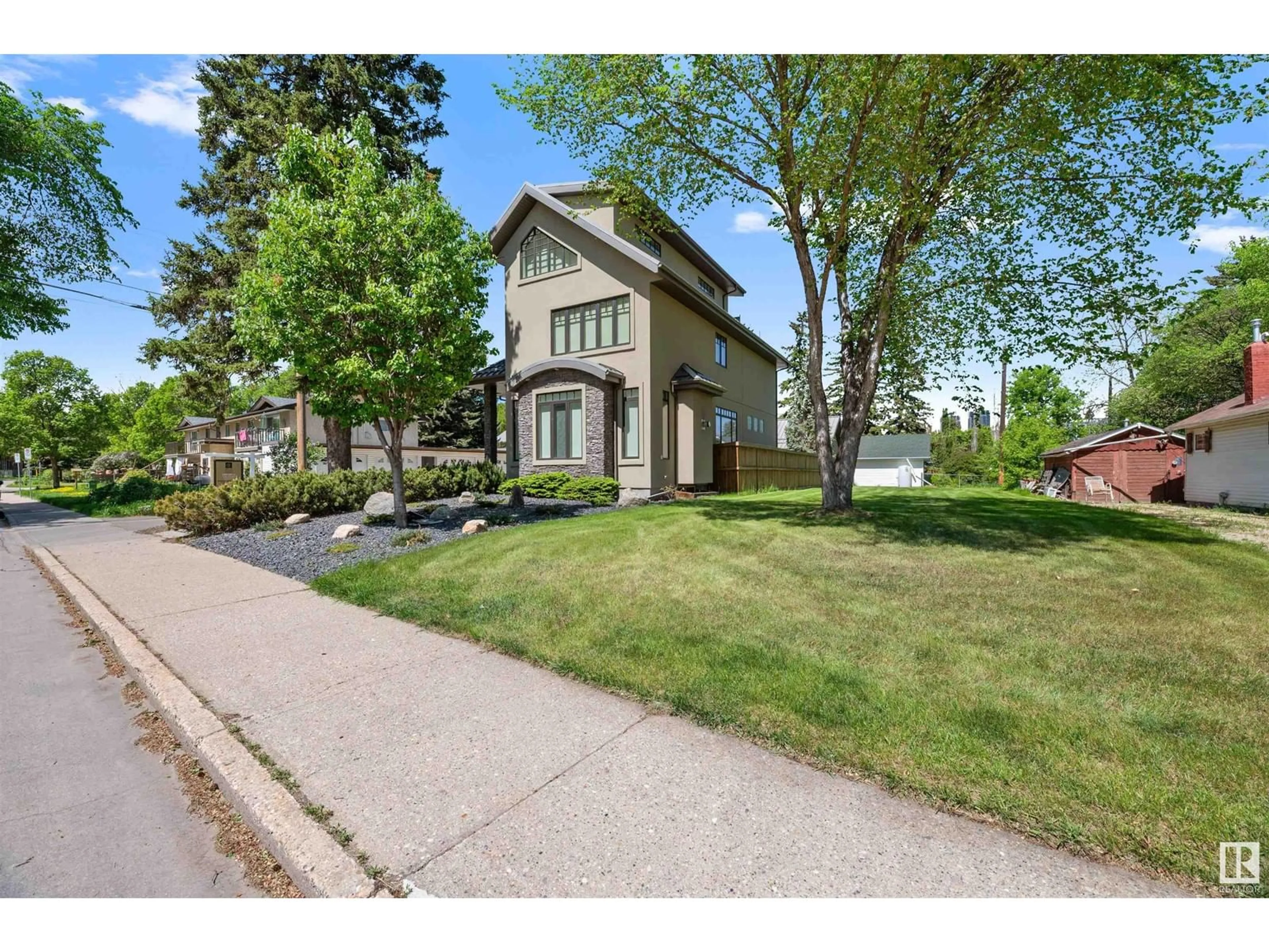 Frontside or backside of a home, the street view for 8728 101 AV NW, Edmonton Alberta T5H0A9