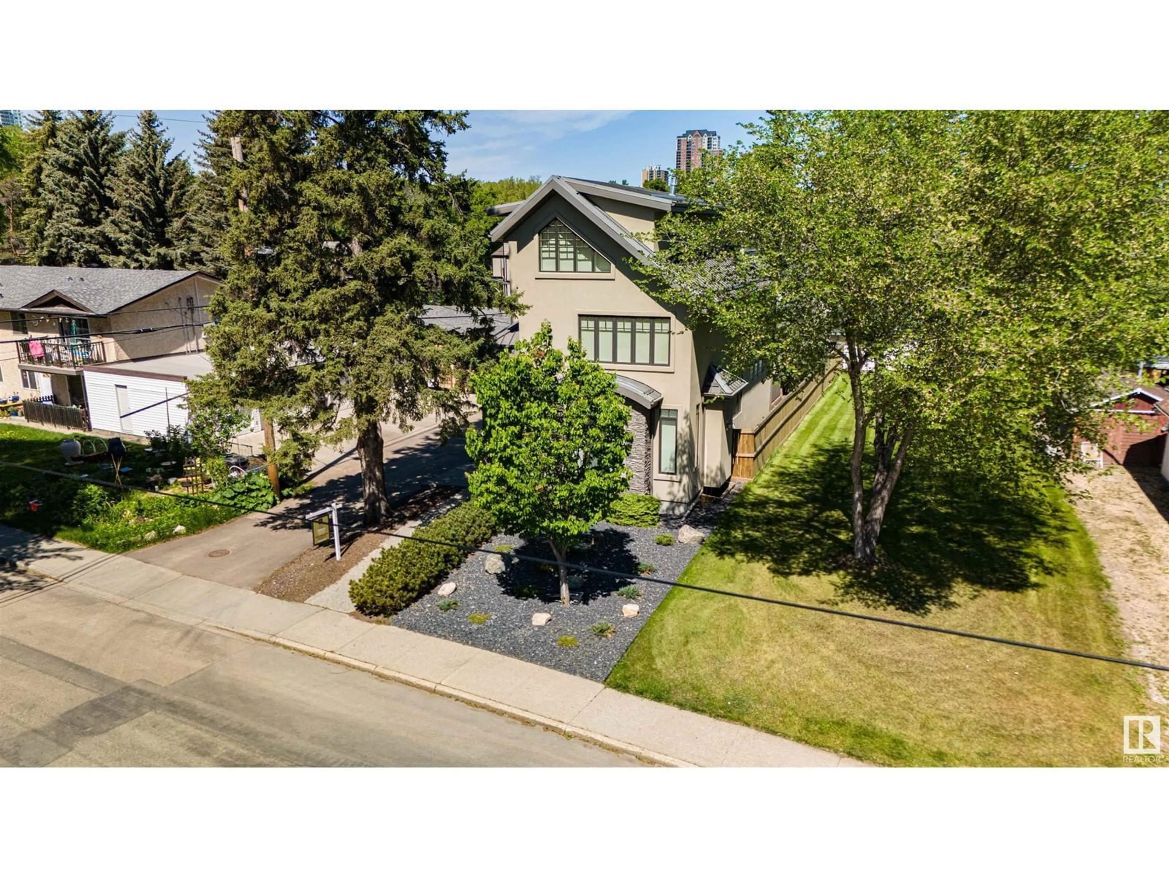 Frontside or backside of a home, the street view for 8728 101 AV NW, Edmonton Alberta T5H0A9