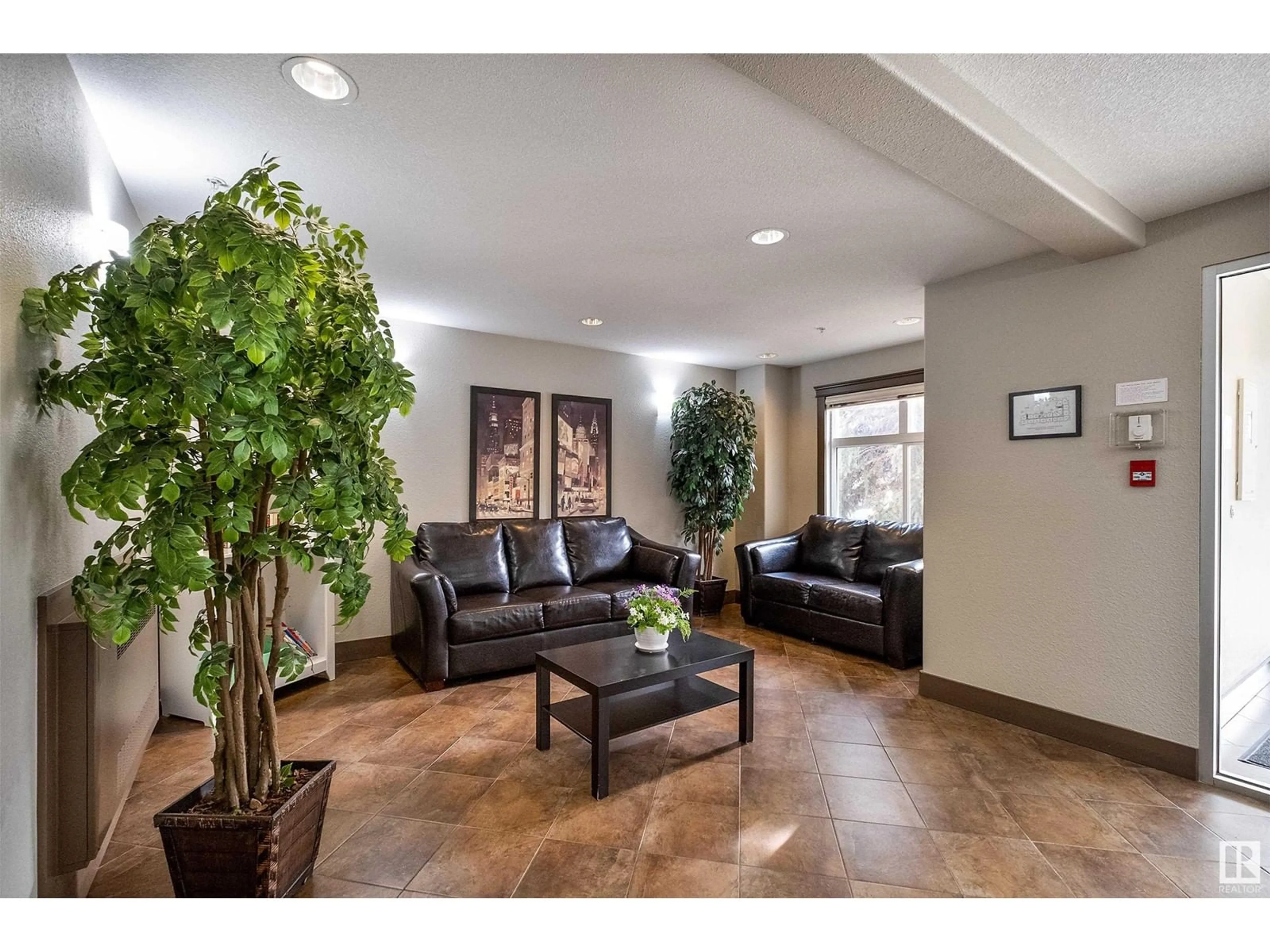 Indoor lobby, wood floors for #216 11615 ELLERSLIE RD SW, Edmonton Alberta T6W0J3