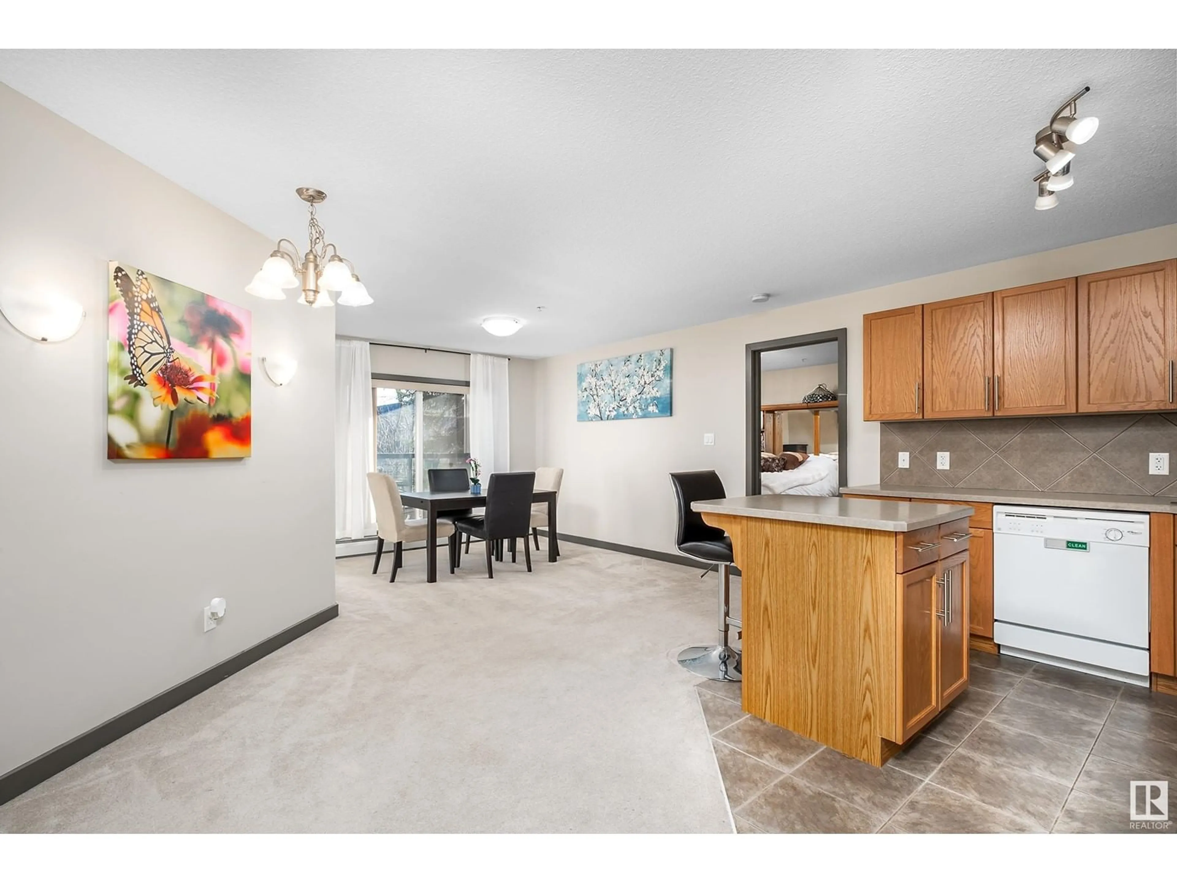 Open concept kitchen for #216 11615 ELLERSLIE RD SW, Edmonton Alberta T6W0J3