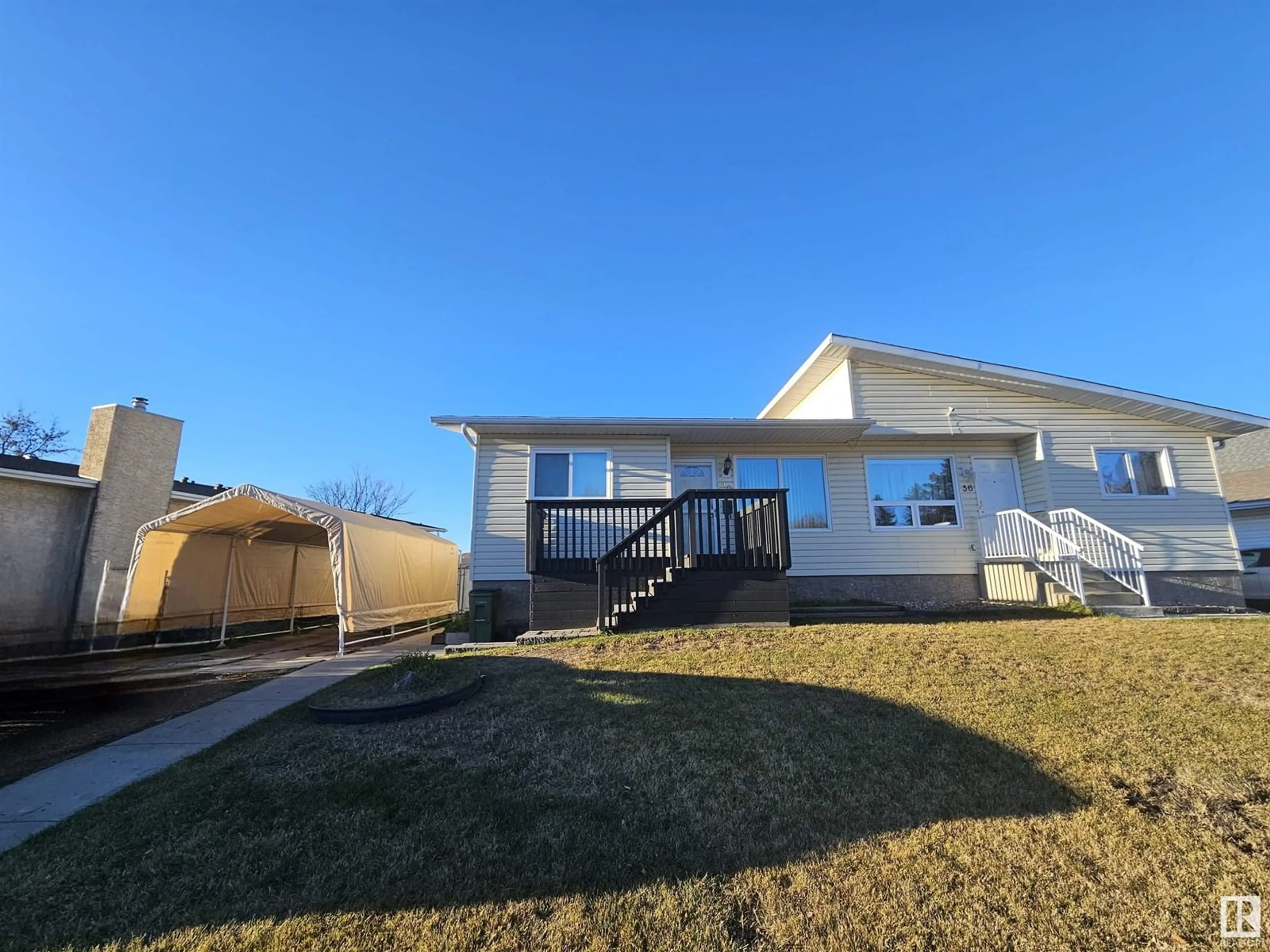 Frontside or backside of a home, the fenced backyard for 40 WARWICK RD NW, Edmonton Alberta T5X4P6