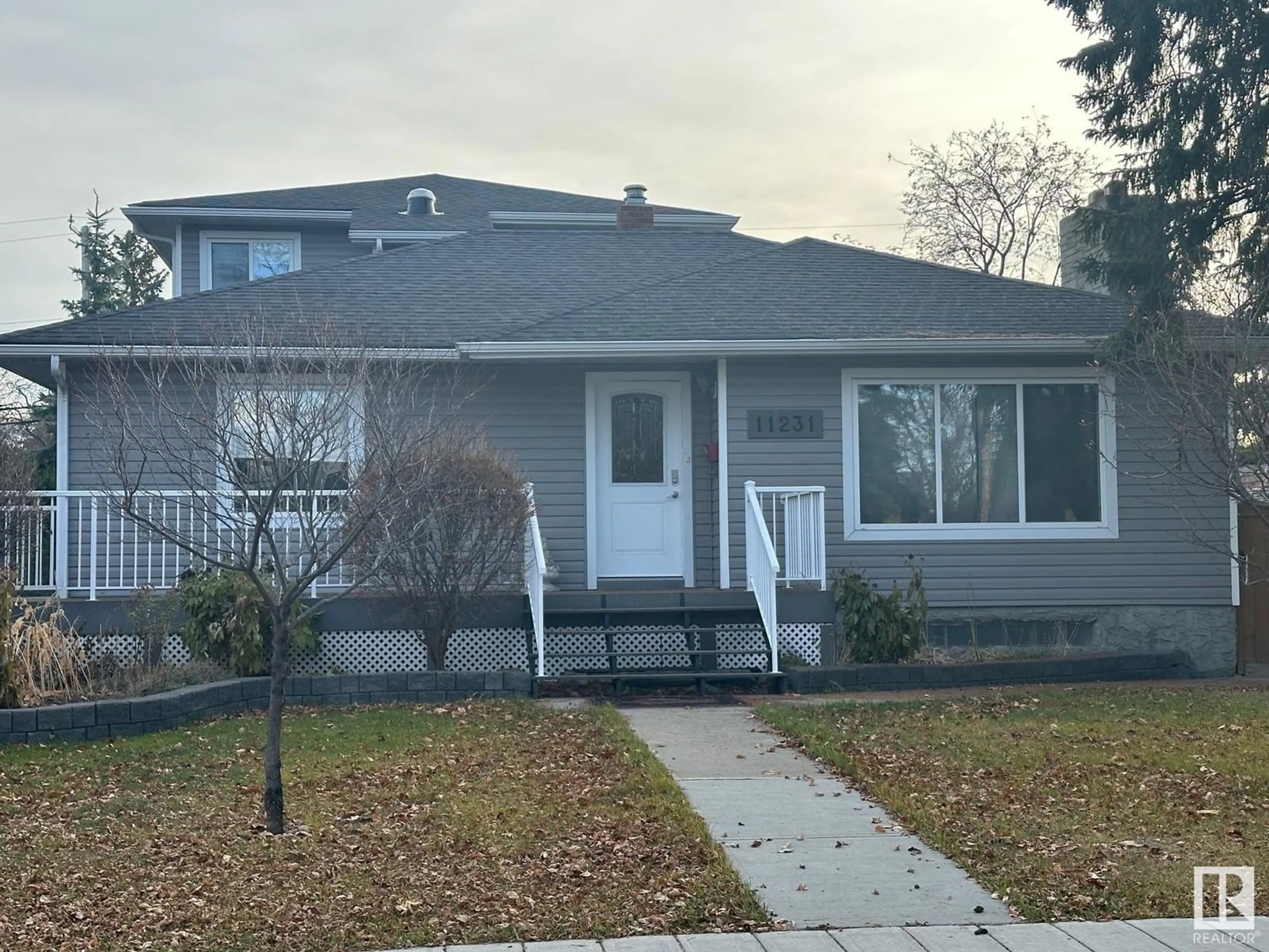 Frontside or backside of a home, the street view for 11231 75 AV NW, Edmonton Alberta T6G0H4