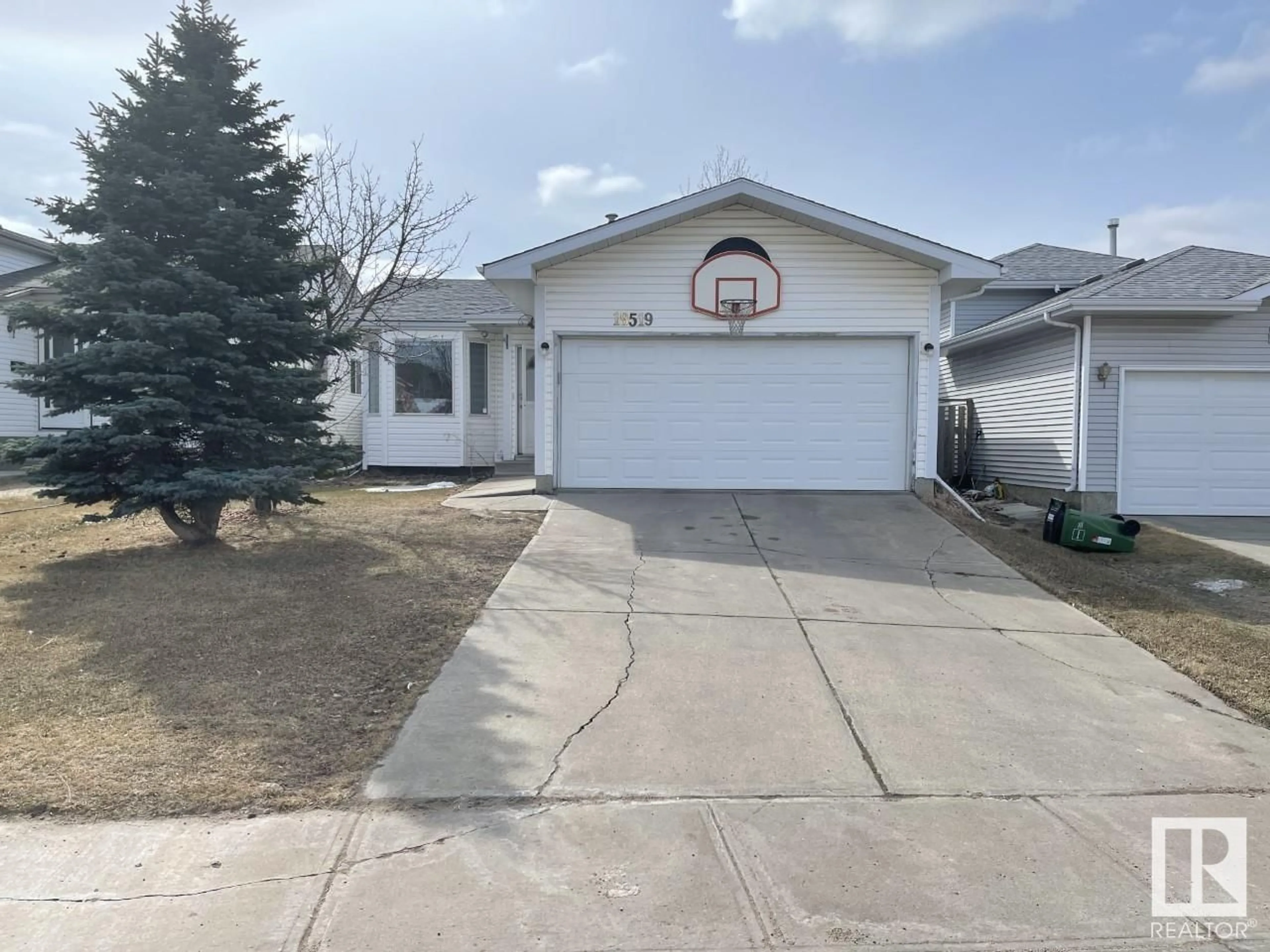 Frontside or backside of a home, the street view for 18519 78 AV NW, Edmonton Alberta T5T5X3