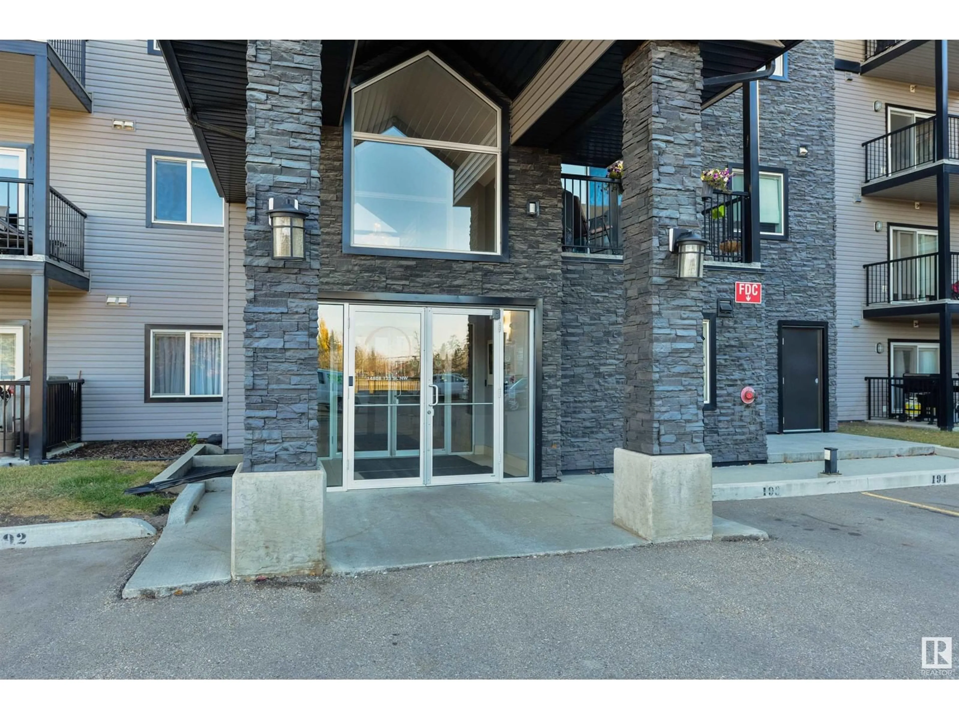 A pic from exterior of the house or condo, the front or back of building for #214 14808 125 ST NW, Edmonton Alberta T5X0G1