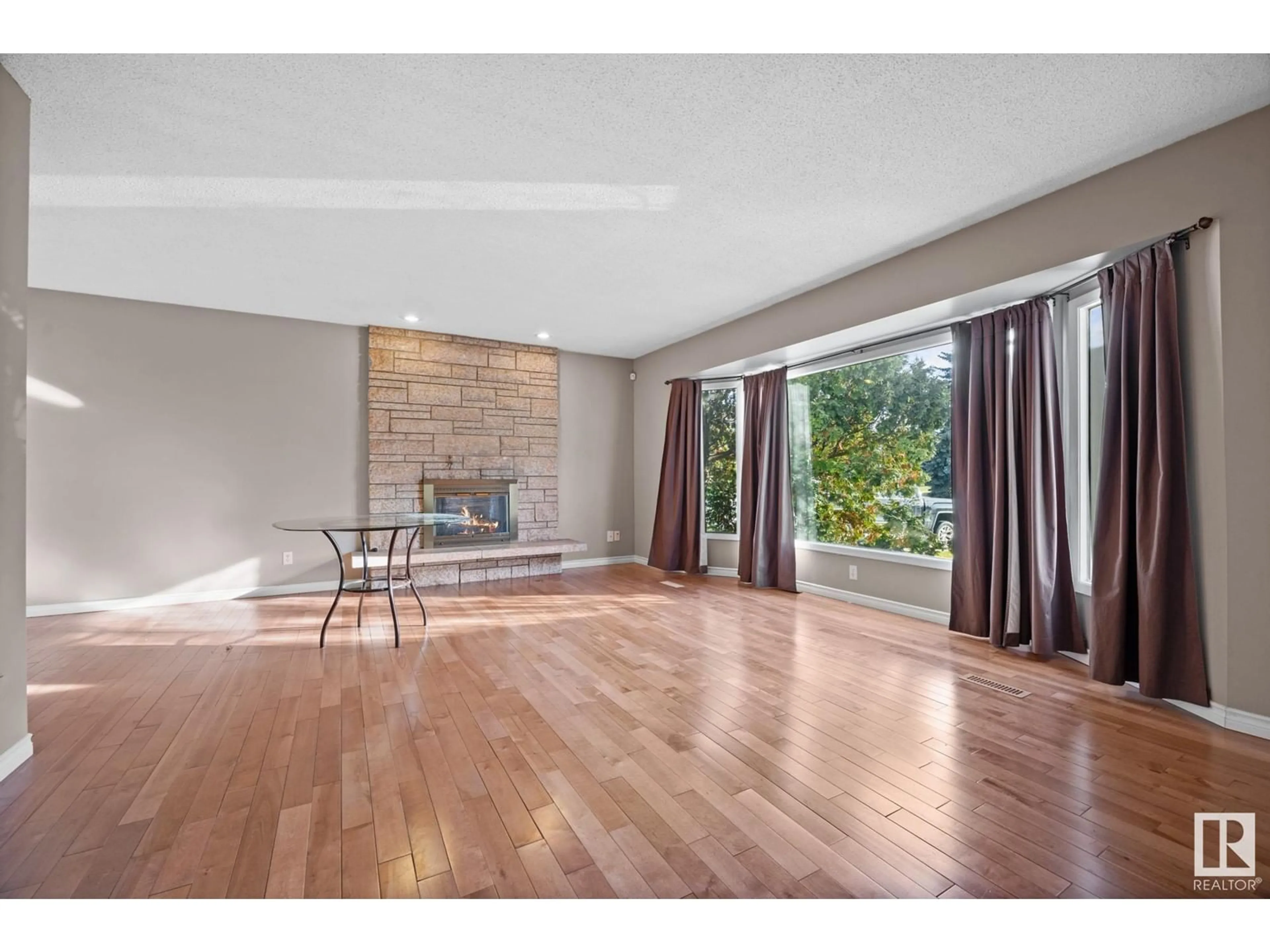 Living room, wood floors for 7912 44 AV NW NW, Edmonton Alberta T6K0Z2