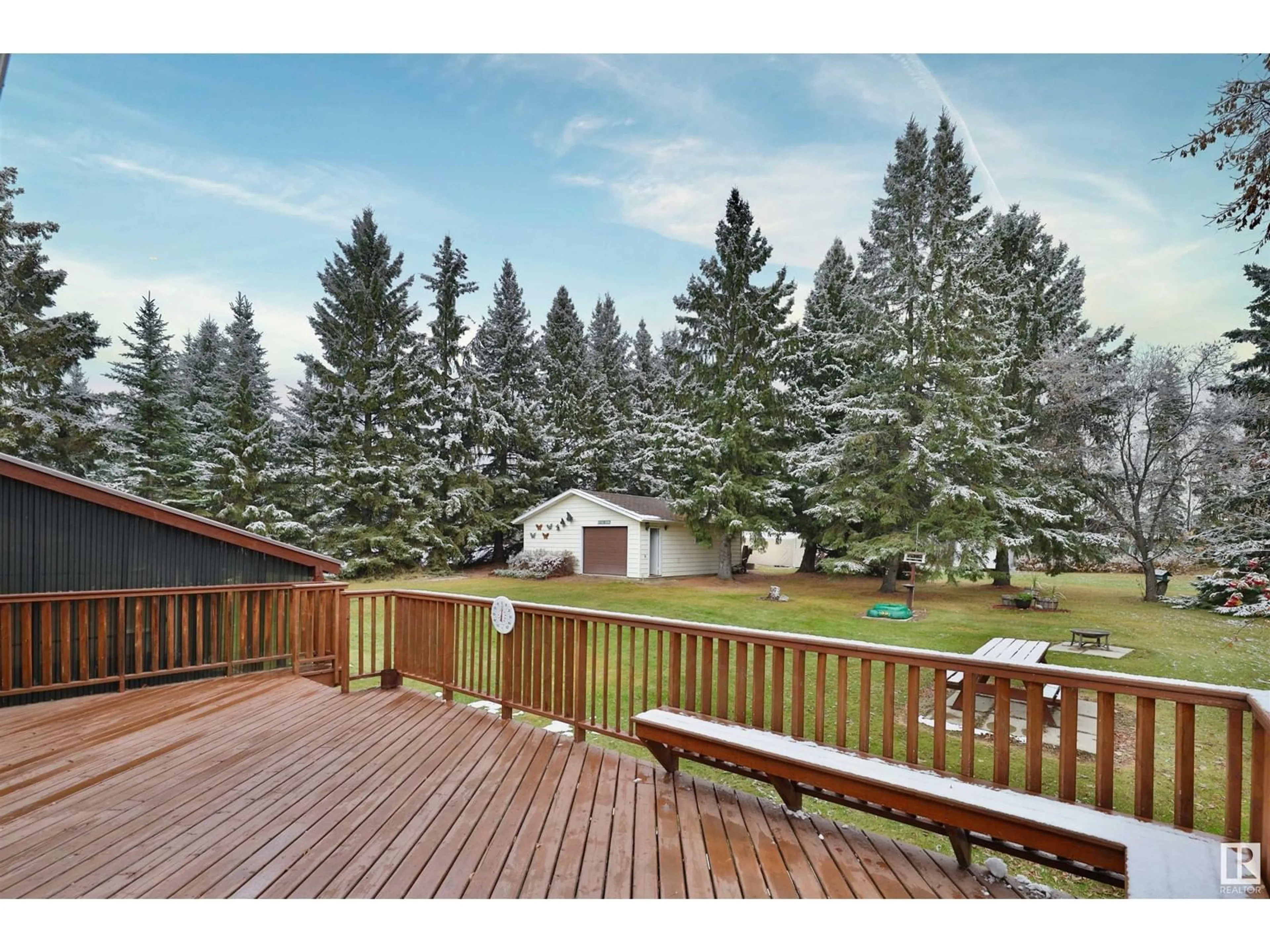 Patio, the fenced backyard for 5152 32 ST, Rural Wetaskiwin County Alberta T0C2C0