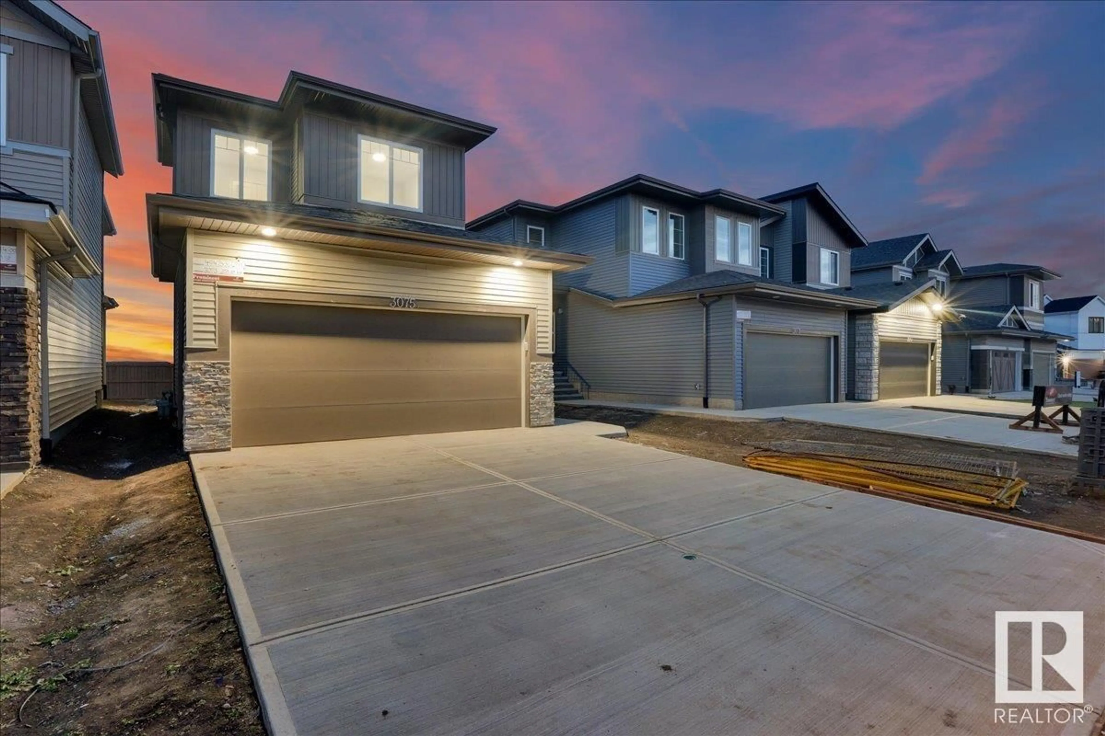 A pic from exterior of the house or condo, the street view for 3075 200 ST NW, Edmonton Alberta T6M1N7