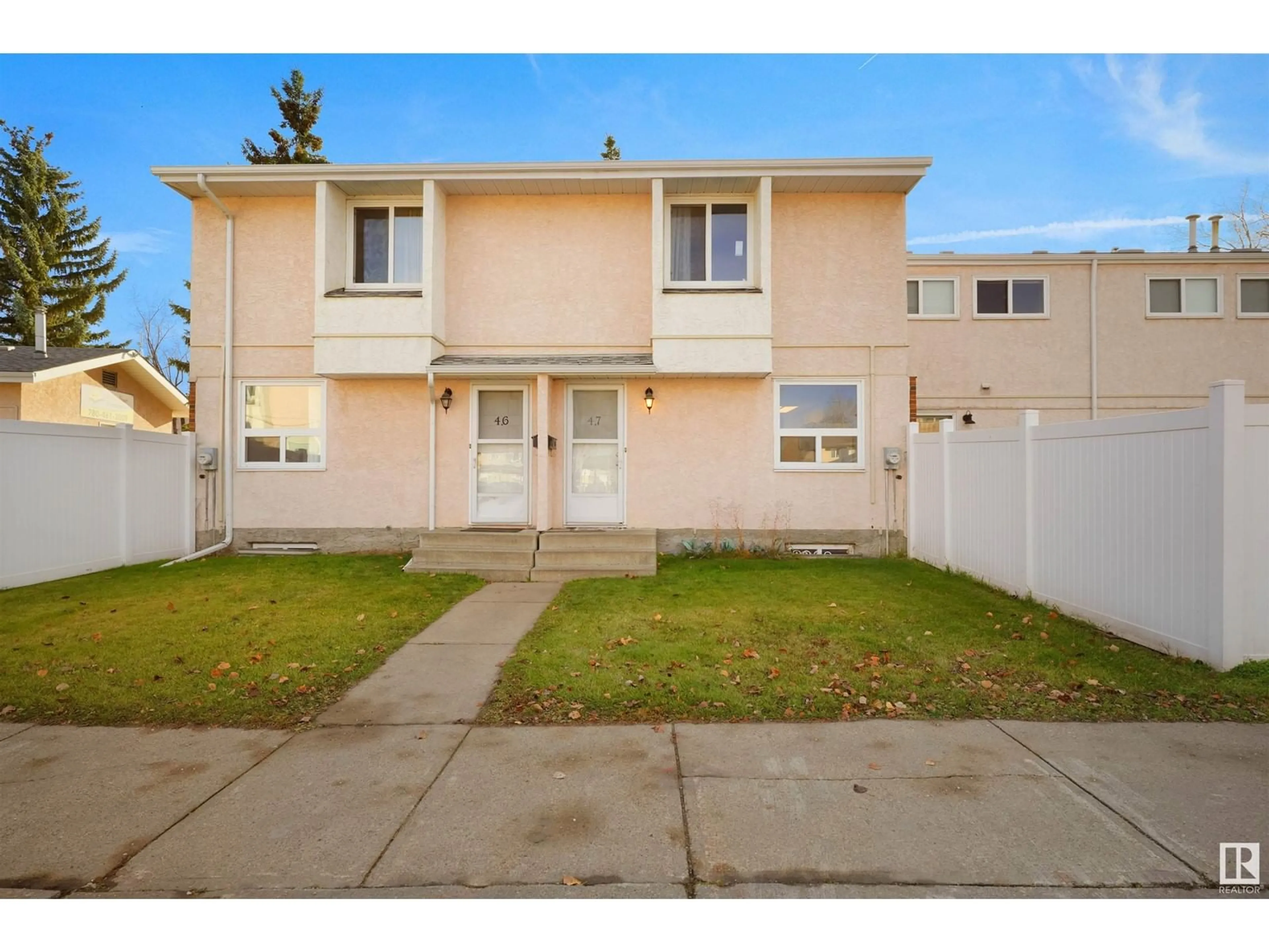 A pic from exterior of the house or condo, the fenced backyard for 47 LAKEWOOD VG NW, Edmonton Alberta T6K2B3