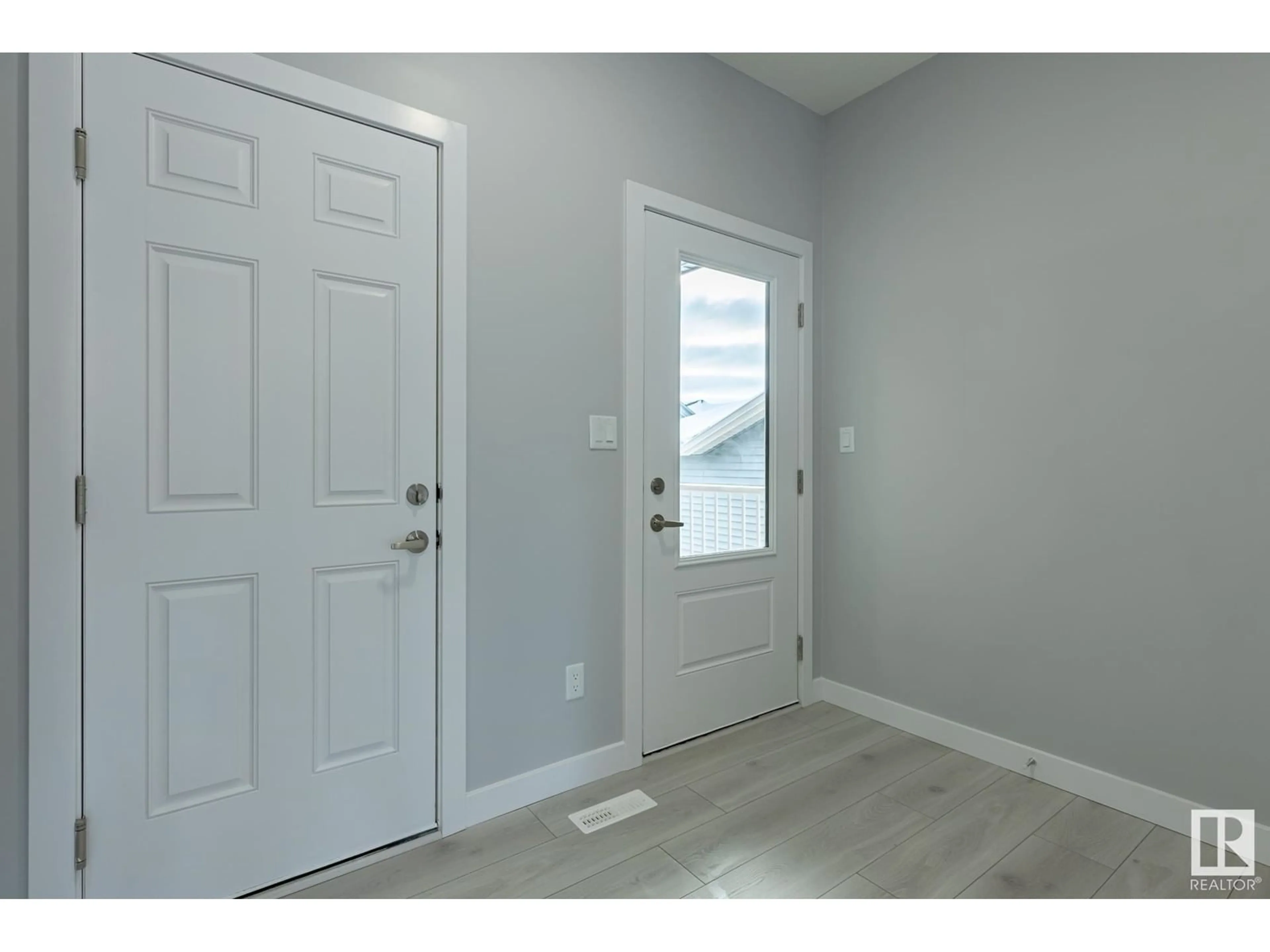 Indoor entryway, cement floor for 8632 97 AV, Morinville Alberta T8R2S1