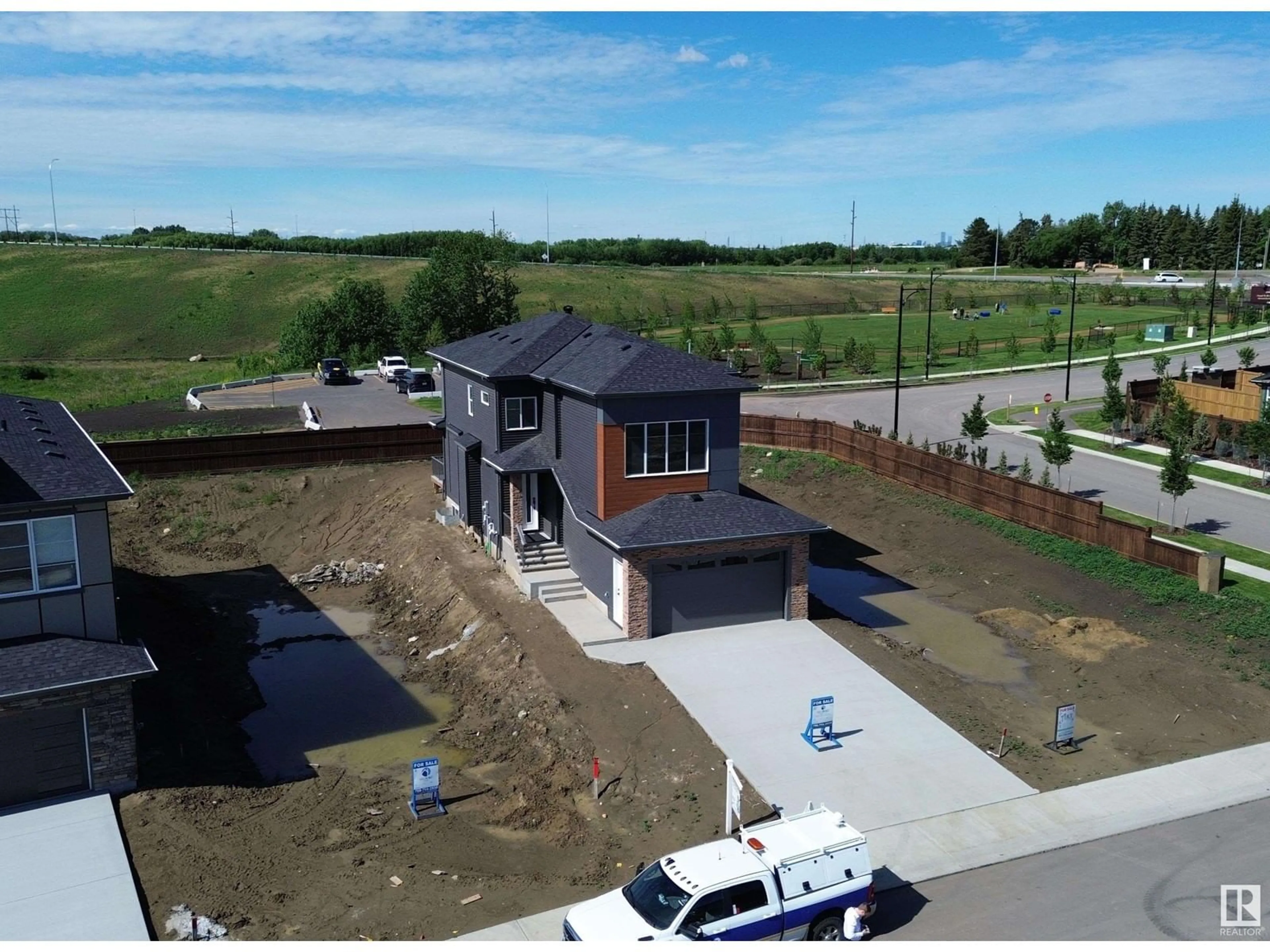 Frontside or backside of a home, the street view for 246 CANTER WYND WD, Sherwood Park Alberta T8H2Z6