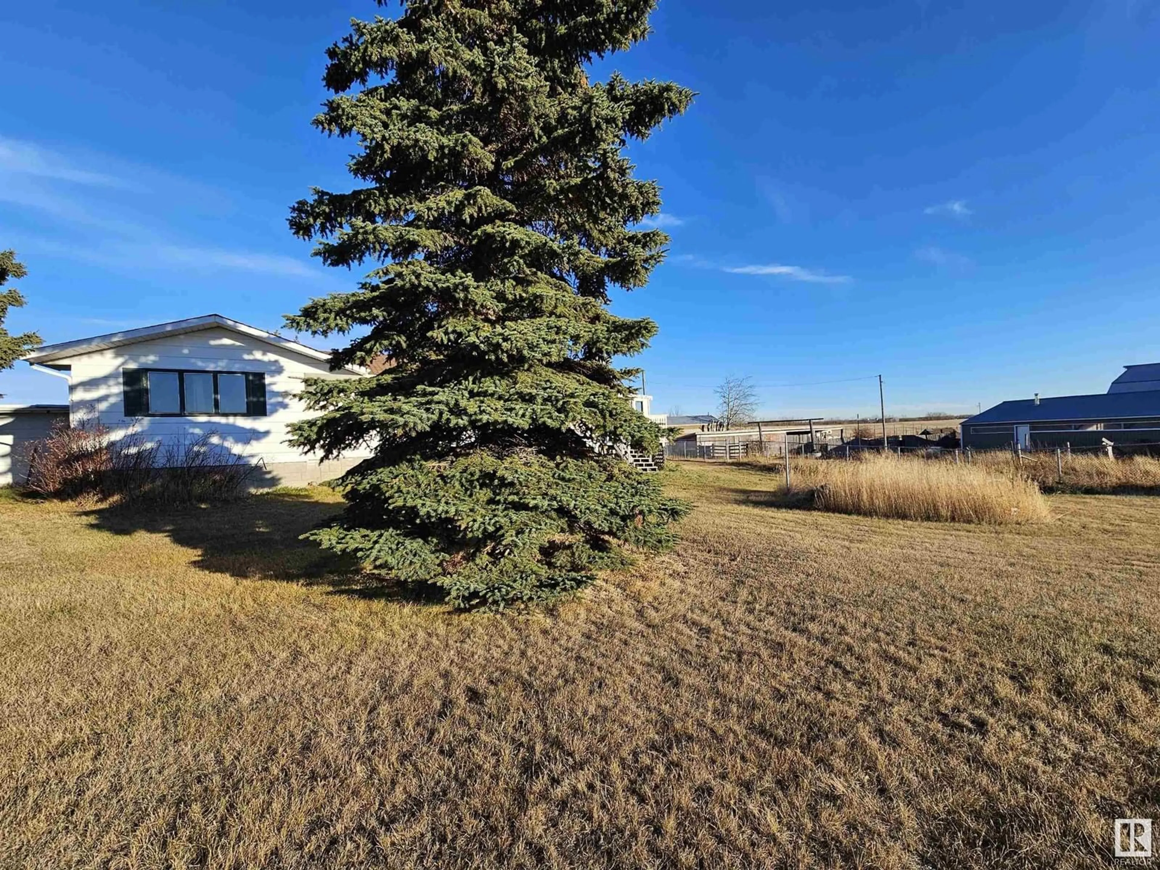 A pic from exterior of the house or condo, the fenced backyard for 23107 TWP ROAD 564, Rural Sturgeon County Alberta T0A1N0