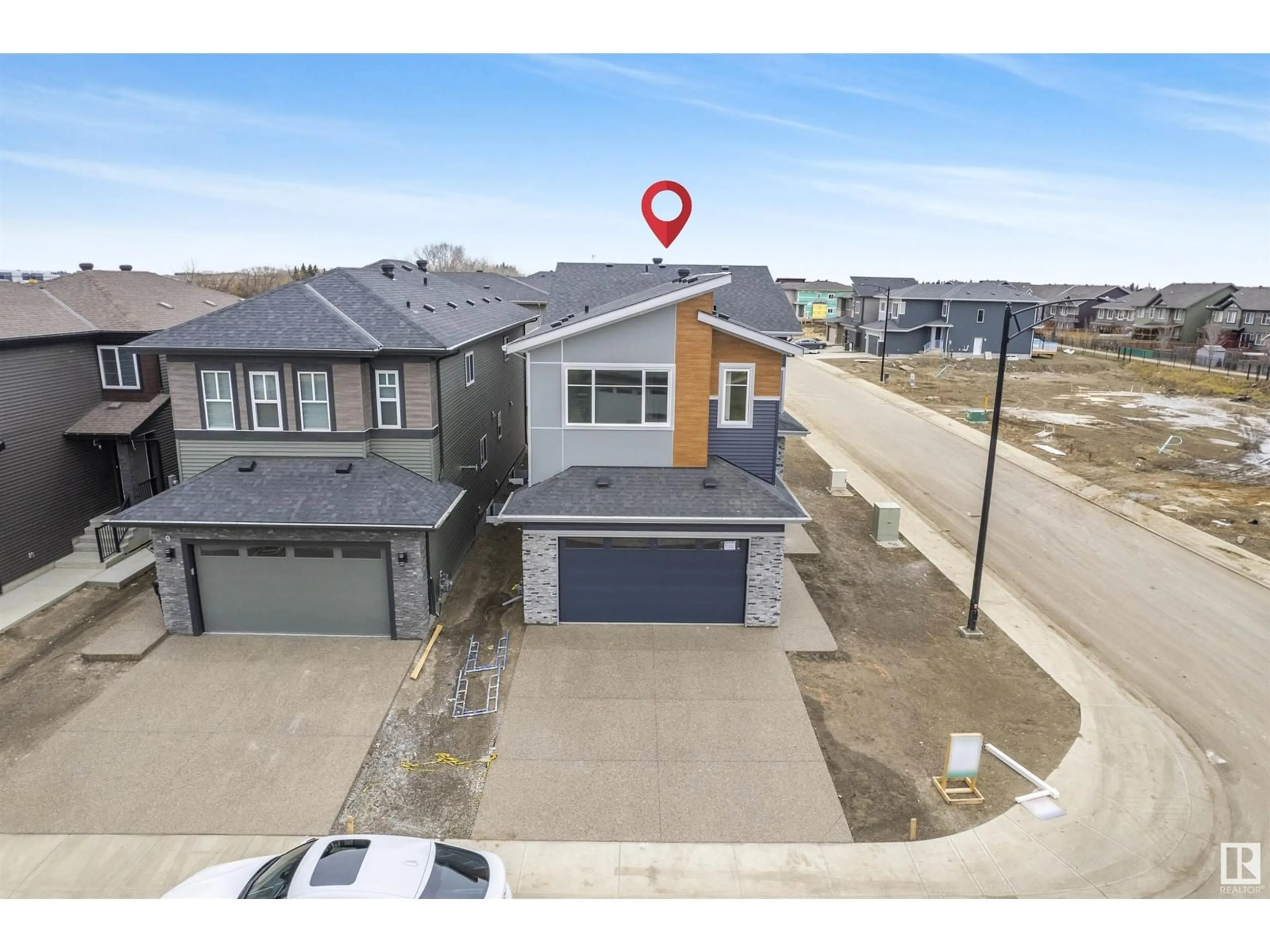 Frontside or backside of a home, the street view for 8904 MAYDAY WAY SW, Edmonton Alberta T6X3E6