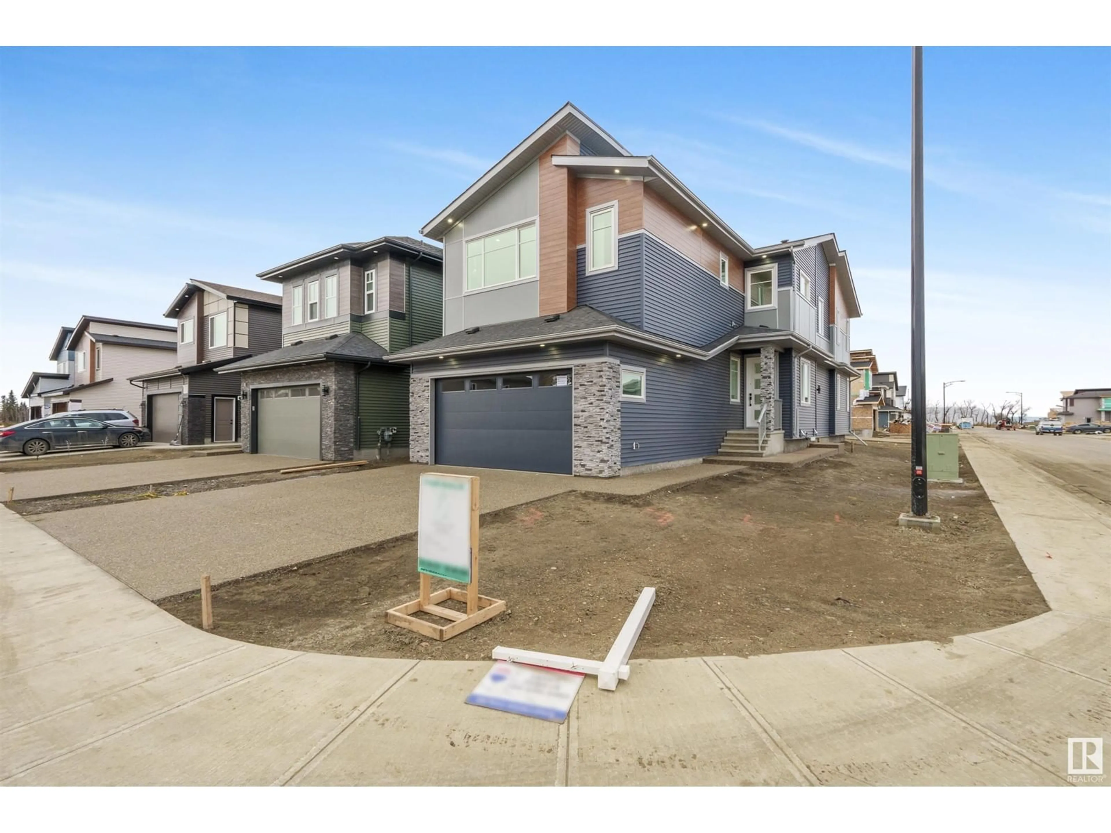 A pic from exterior of the house or condo, the street view for 8904 MAYDAY WAY SW, Edmonton Alberta T6X3E6