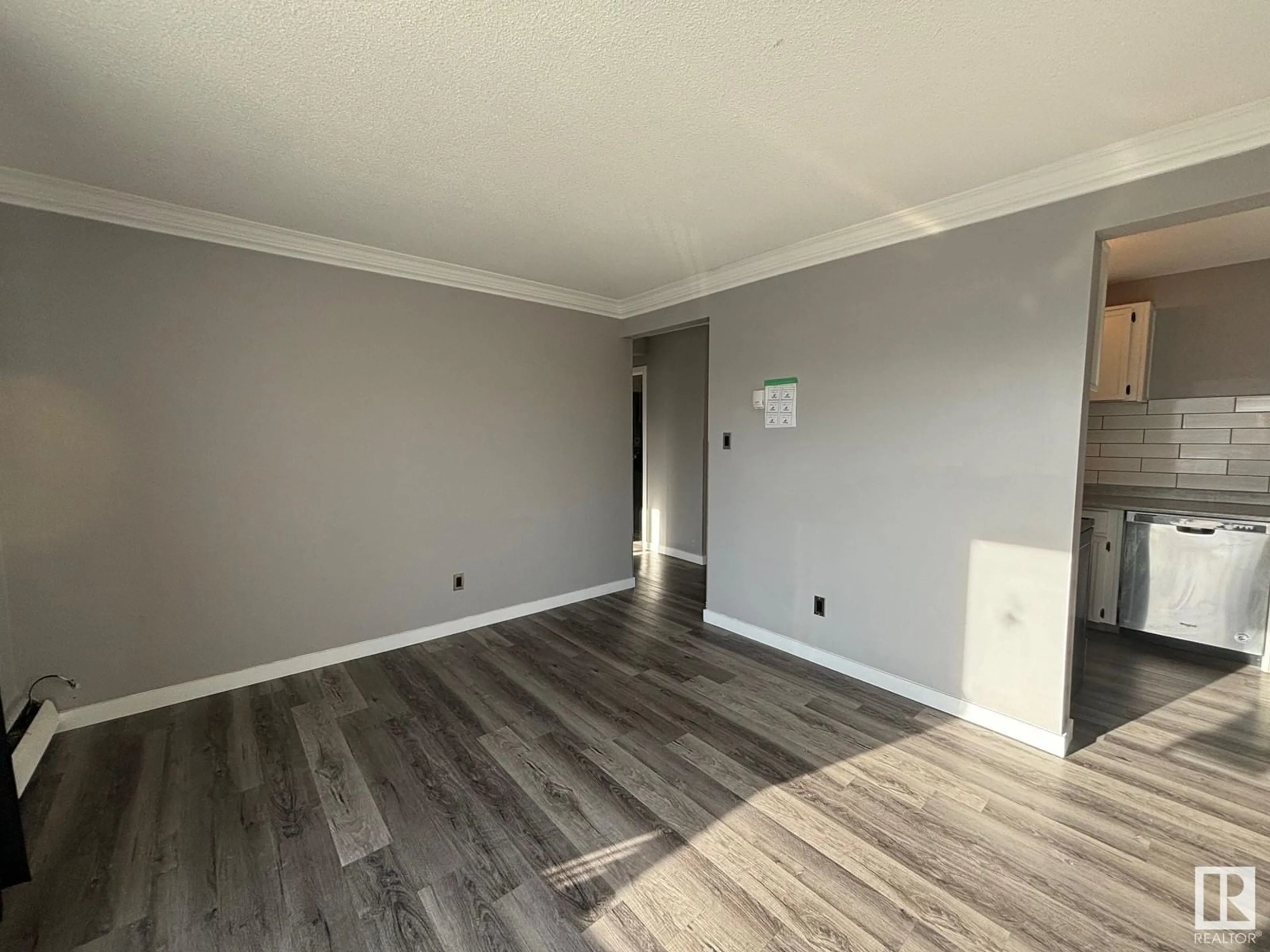 A pic of a room, wood floors for #303 6307 118 AV NW, Edmonton Alberta T5W1G2