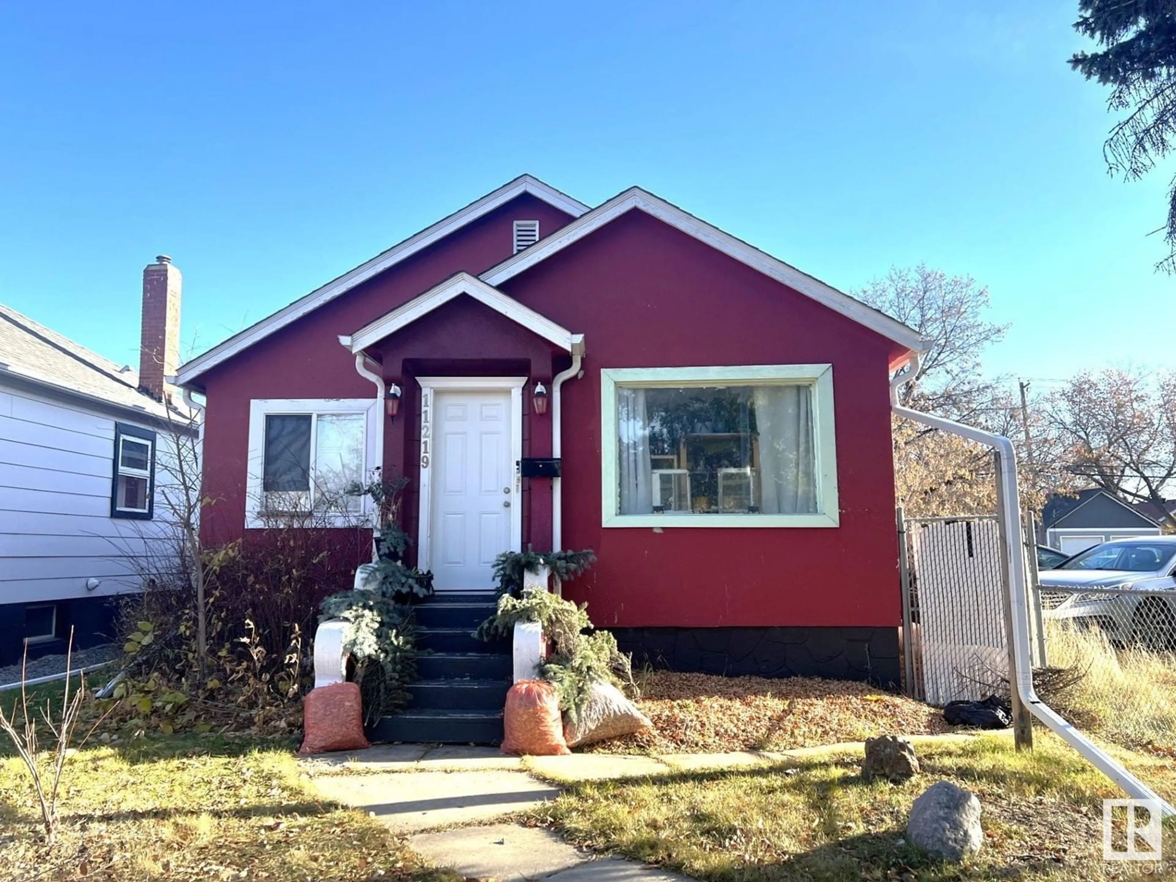 Frontside or backside of a home, cottage for 11219 101 ST NW, Edmonton Alberta T5G2A4