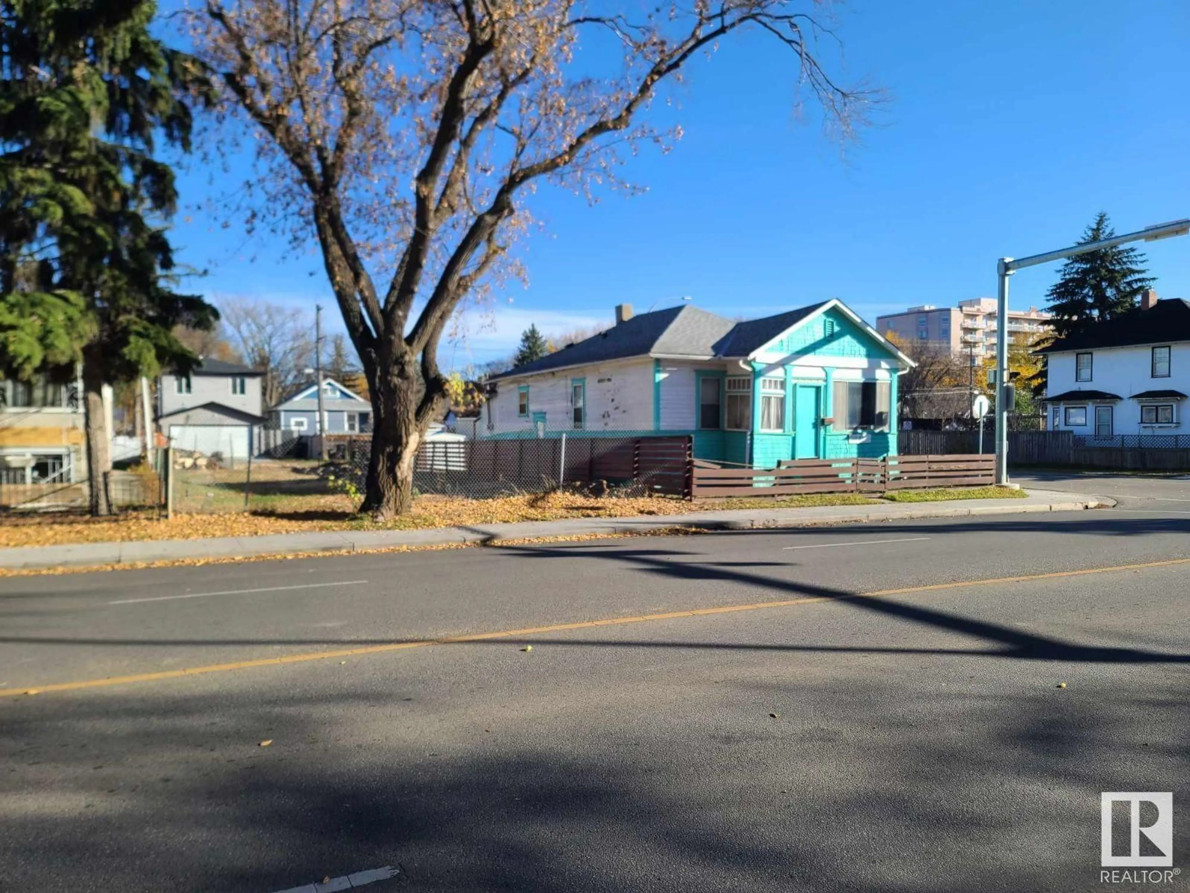 A pic from exterior of the house or condo, the street view for 11303 86 ST NW, Edmonton Alberta T5B3H9