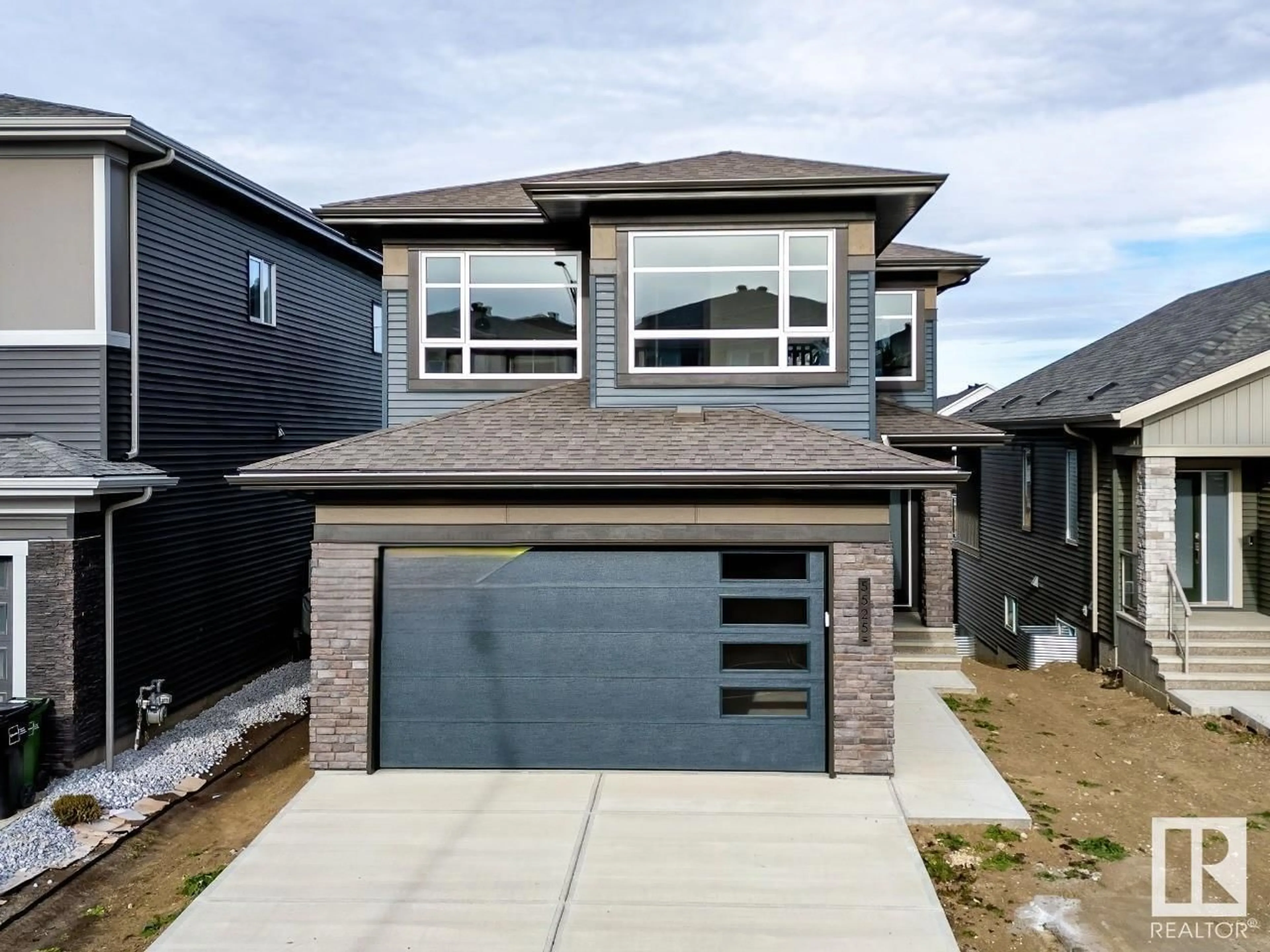 Frontside or backside of a home, the street view for 5525 KOOTOOK RD SW, Edmonton Alberta T6W1A5