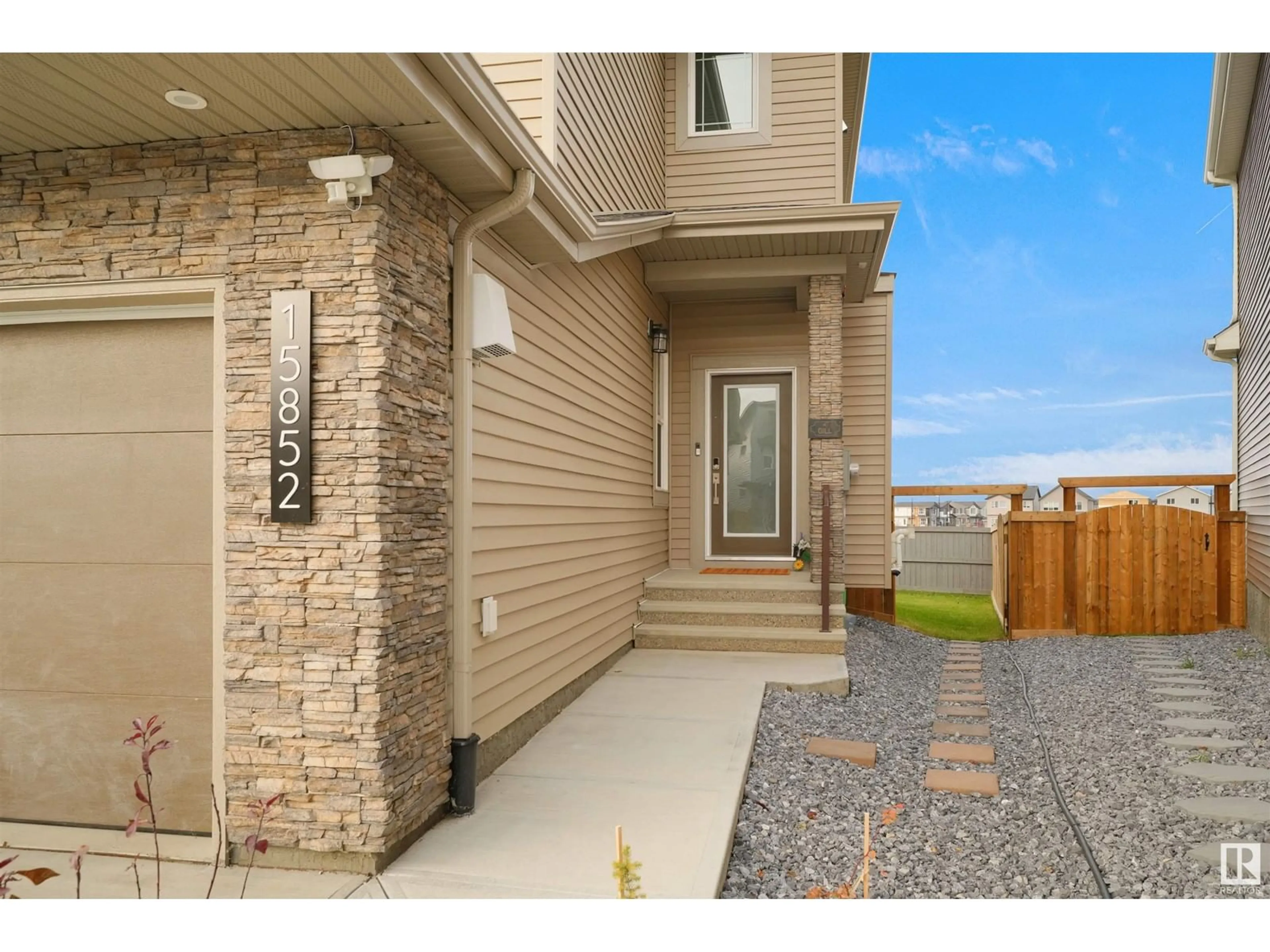 Frontside or backside of a home, the street view for 15852 29 AV SW, Edmonton Alberta T6W4X4