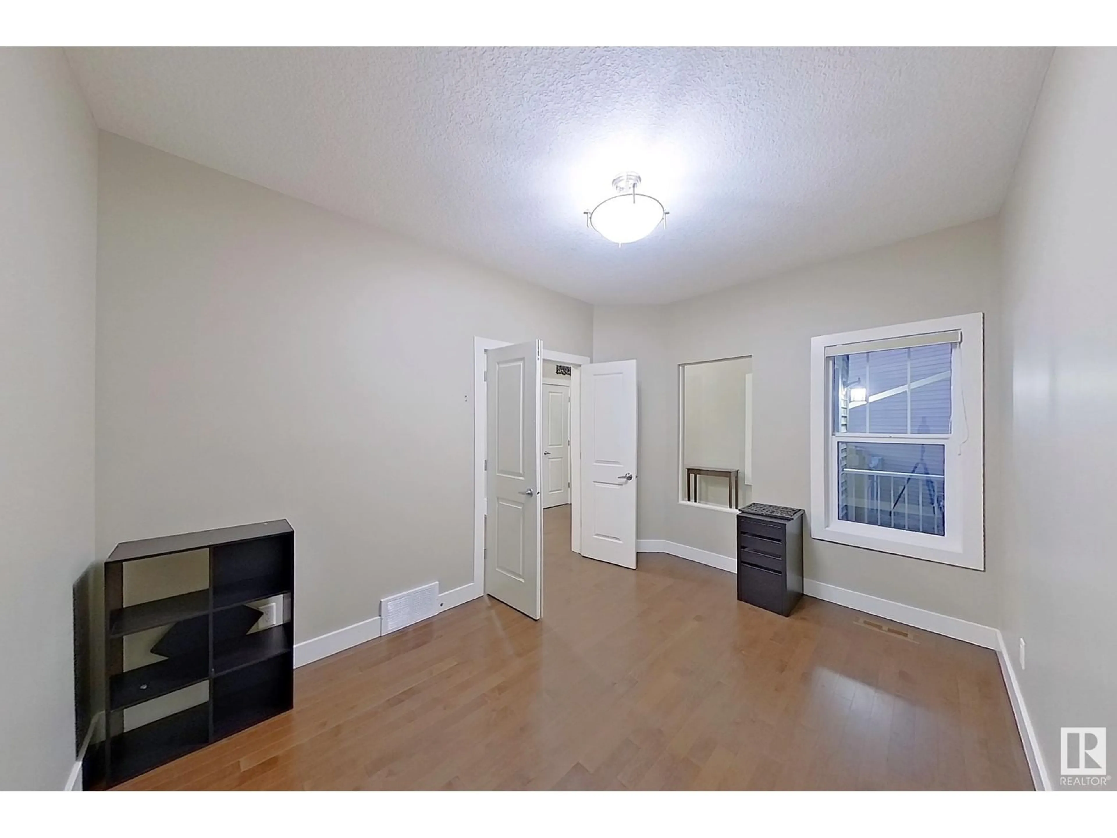 A pic of a room, wood floors for 3938 cherry cove SW SW, Edmonton Alberta T6X2B3