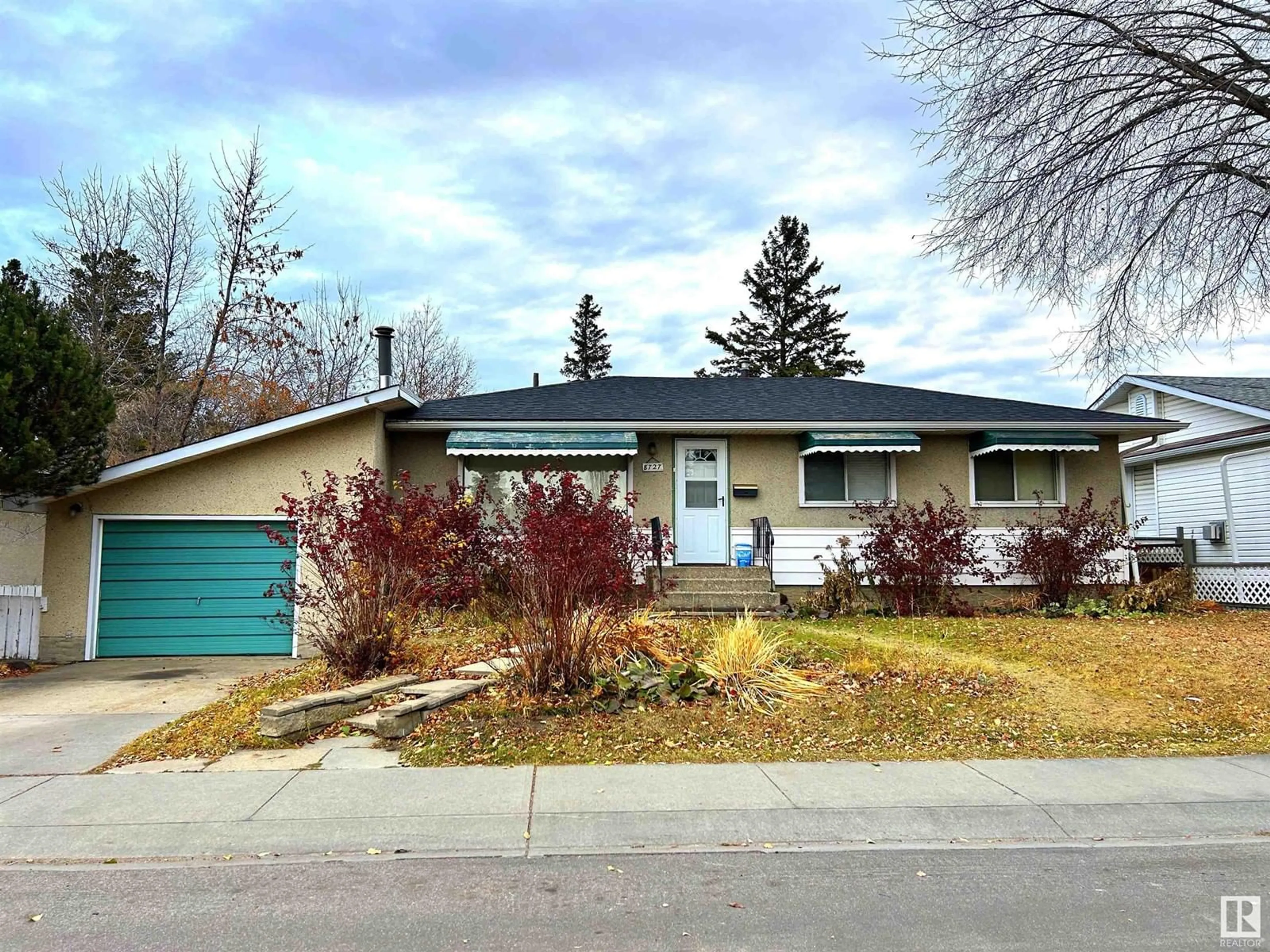 A pic from exterior of the house or condo, the street view for 8727 163 ST NW, Edmonton Alberta T5R2N7