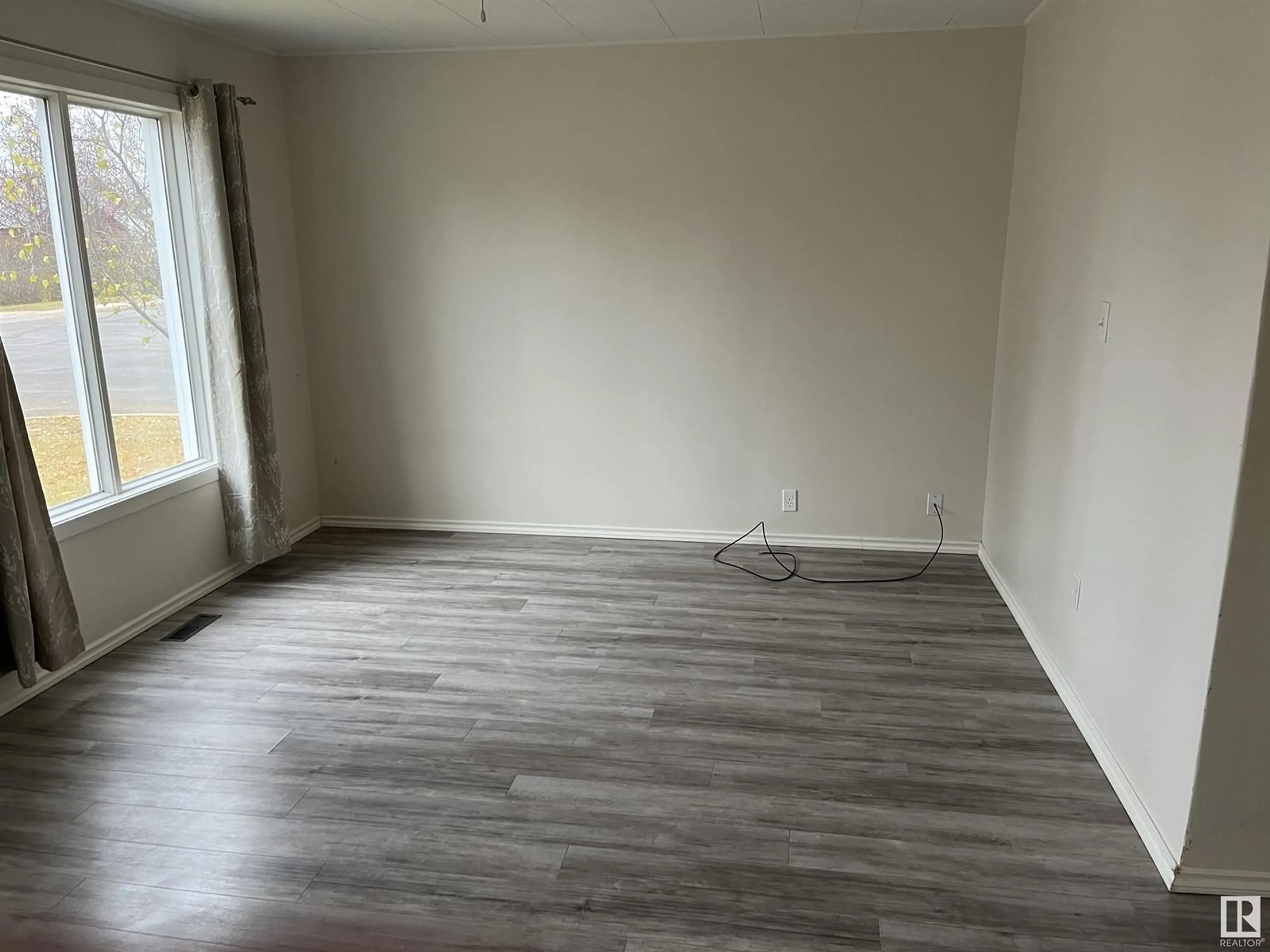 A pic of a room, not visible floor for 5103 55 AV, Tofield Alberta T0B4N0