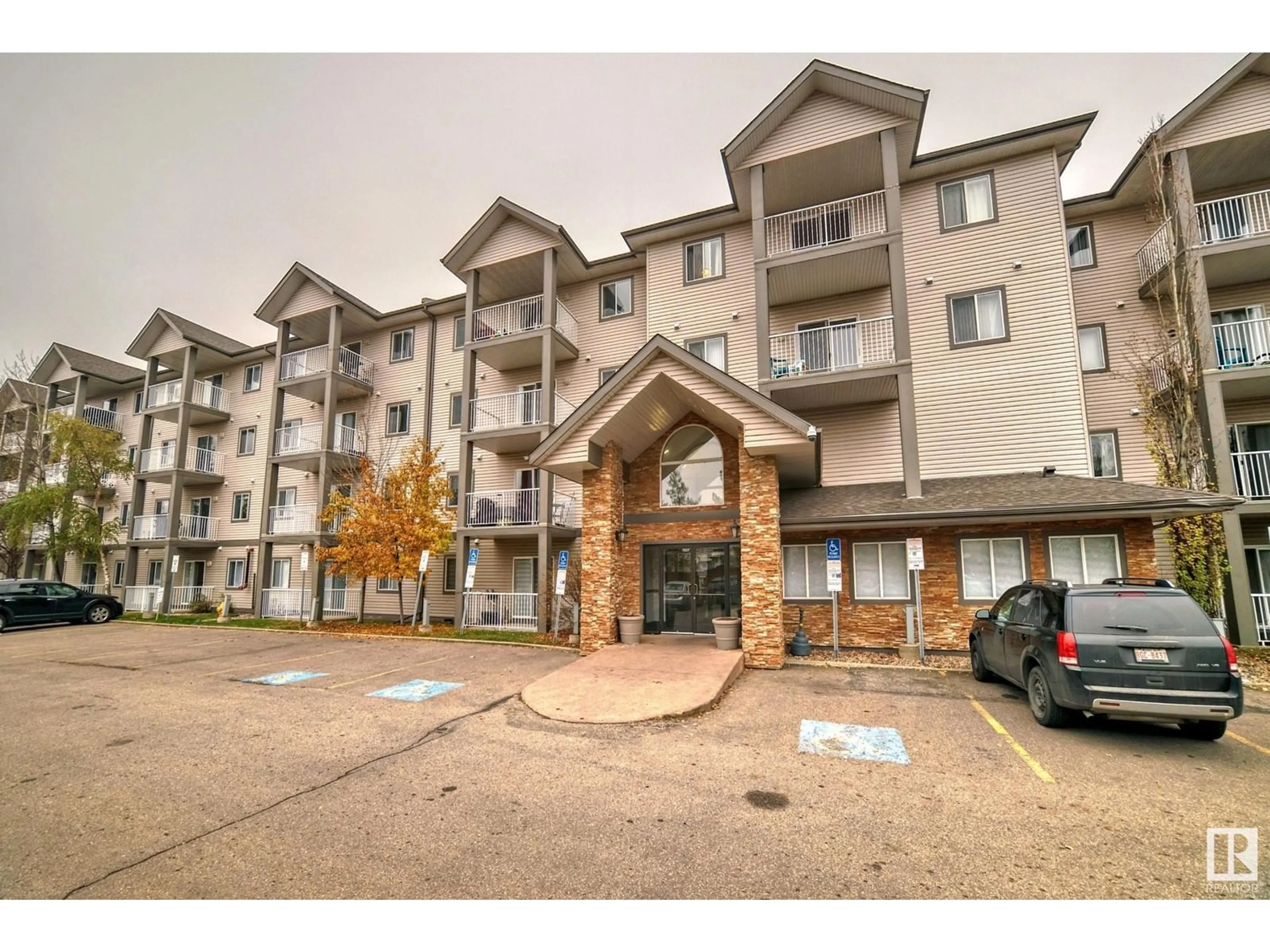 A pic from exterior of the house or condo, the front or back of building for #135 3425 19 St NW, Edmonton Alberta T6T2B5