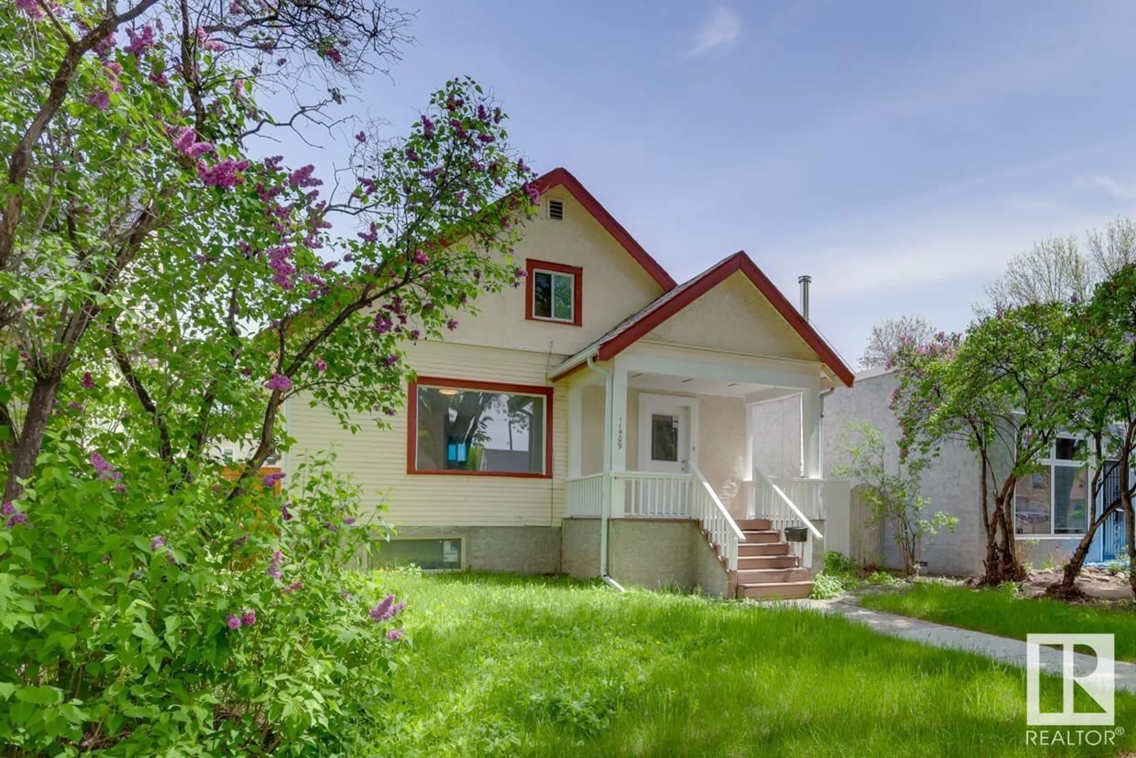 Frontside or backside of a home, cottage for 11409 90 ST NW, Edmonton Alberta T5B3X8