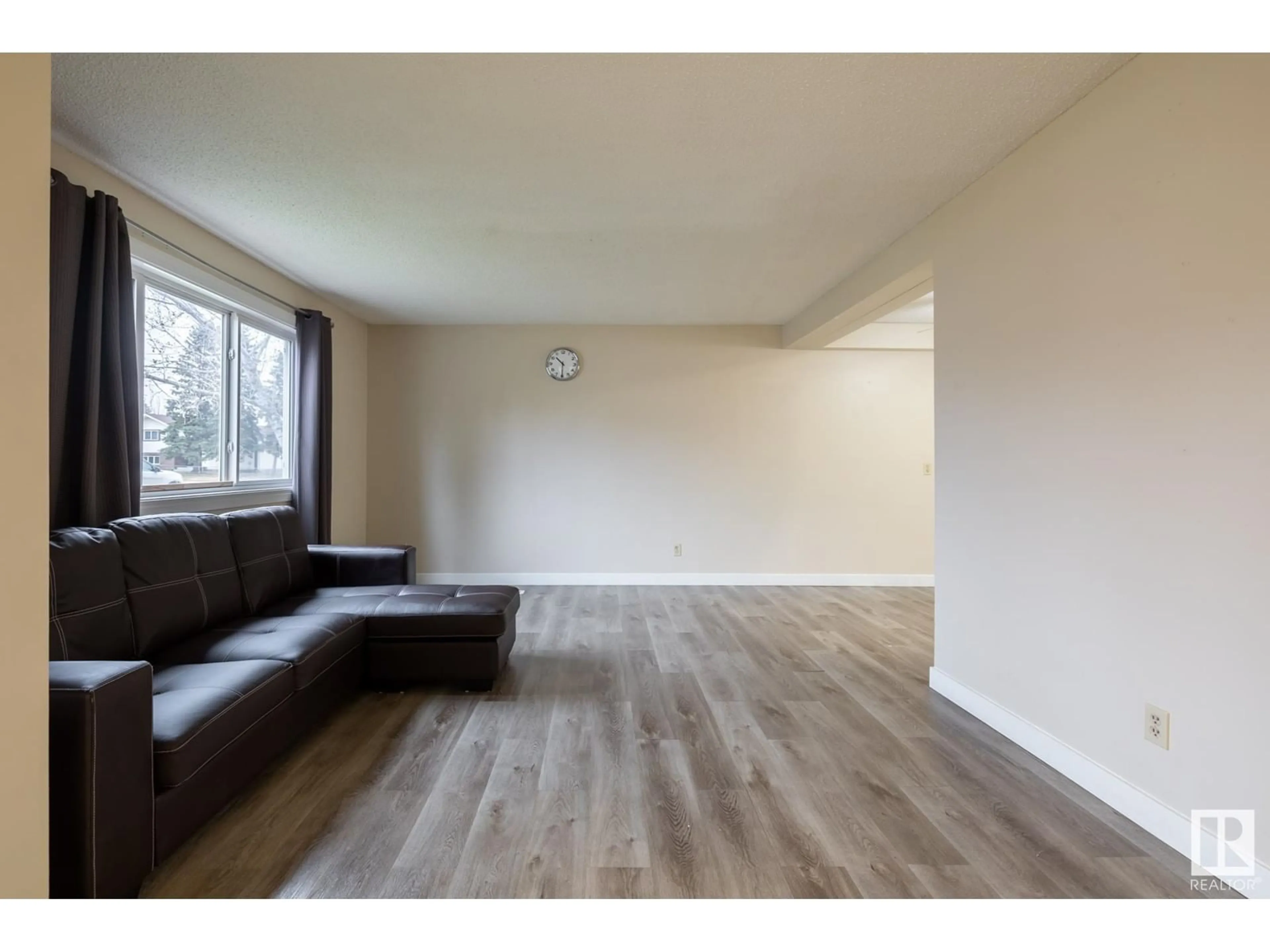 A pic of a room, wood floors for 8439 29 AV NW, Edmonton Alberta T6K3M8