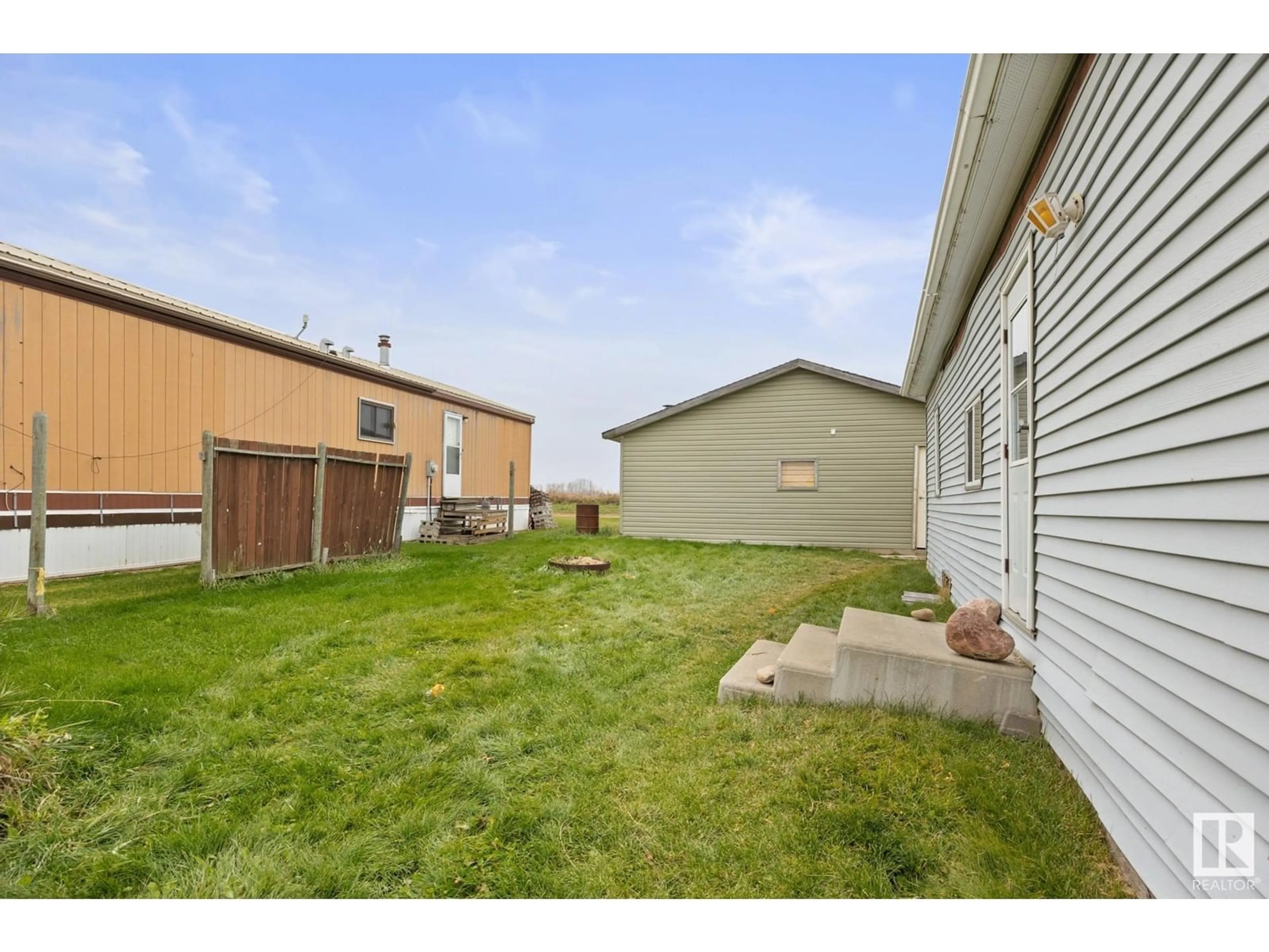 Patio, the fenced backyard for 4712 50 ST, Vimy Alberta T0G0A7