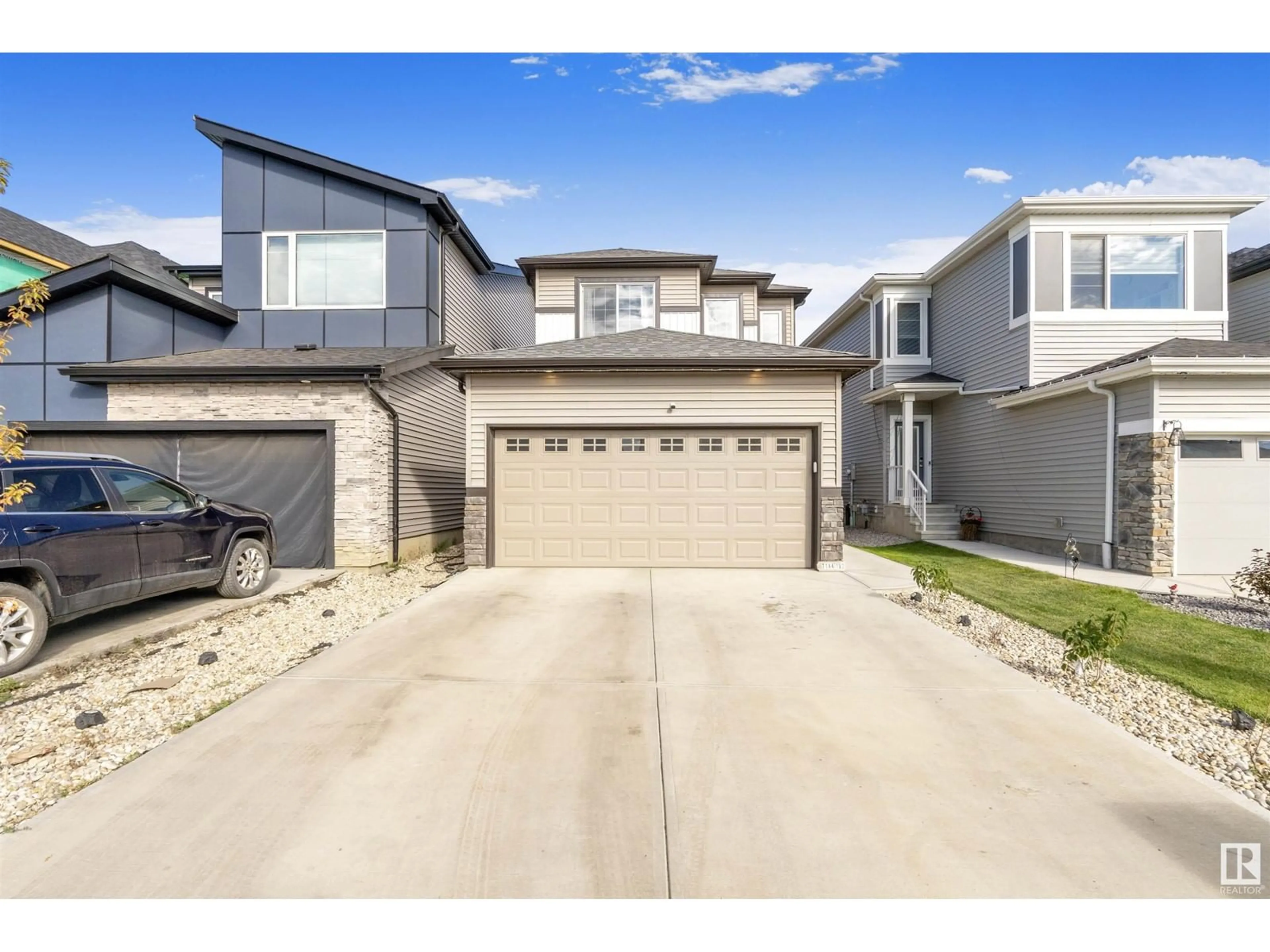 Frontside or backside of a home, the street view for 7144 182 AV NW, Edmonton Alberta T5Z0V7