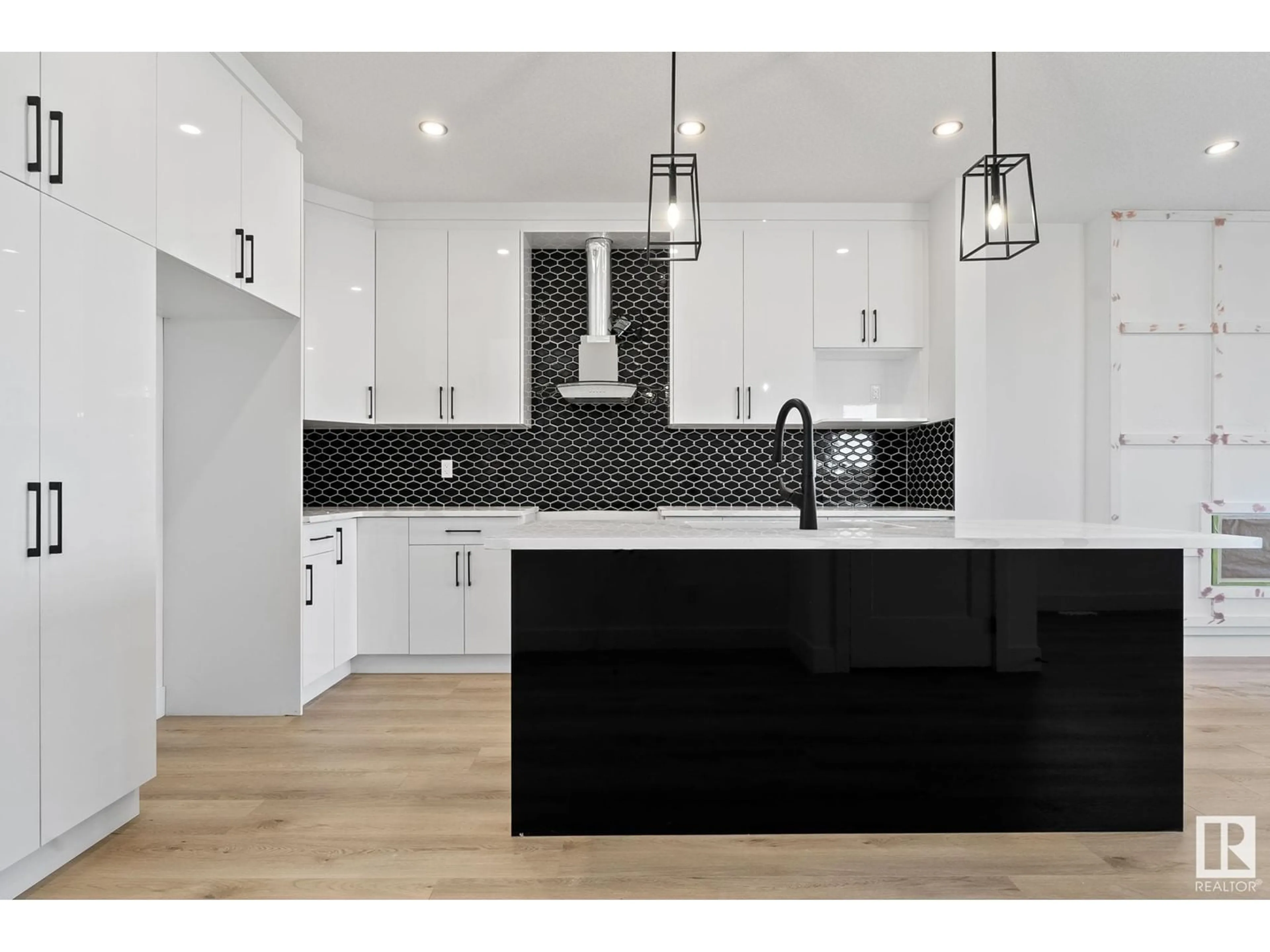 Contemporary kitchen, wood floors, mountain for 715 30 AV NW, Edmonton Alberta T6T1J2