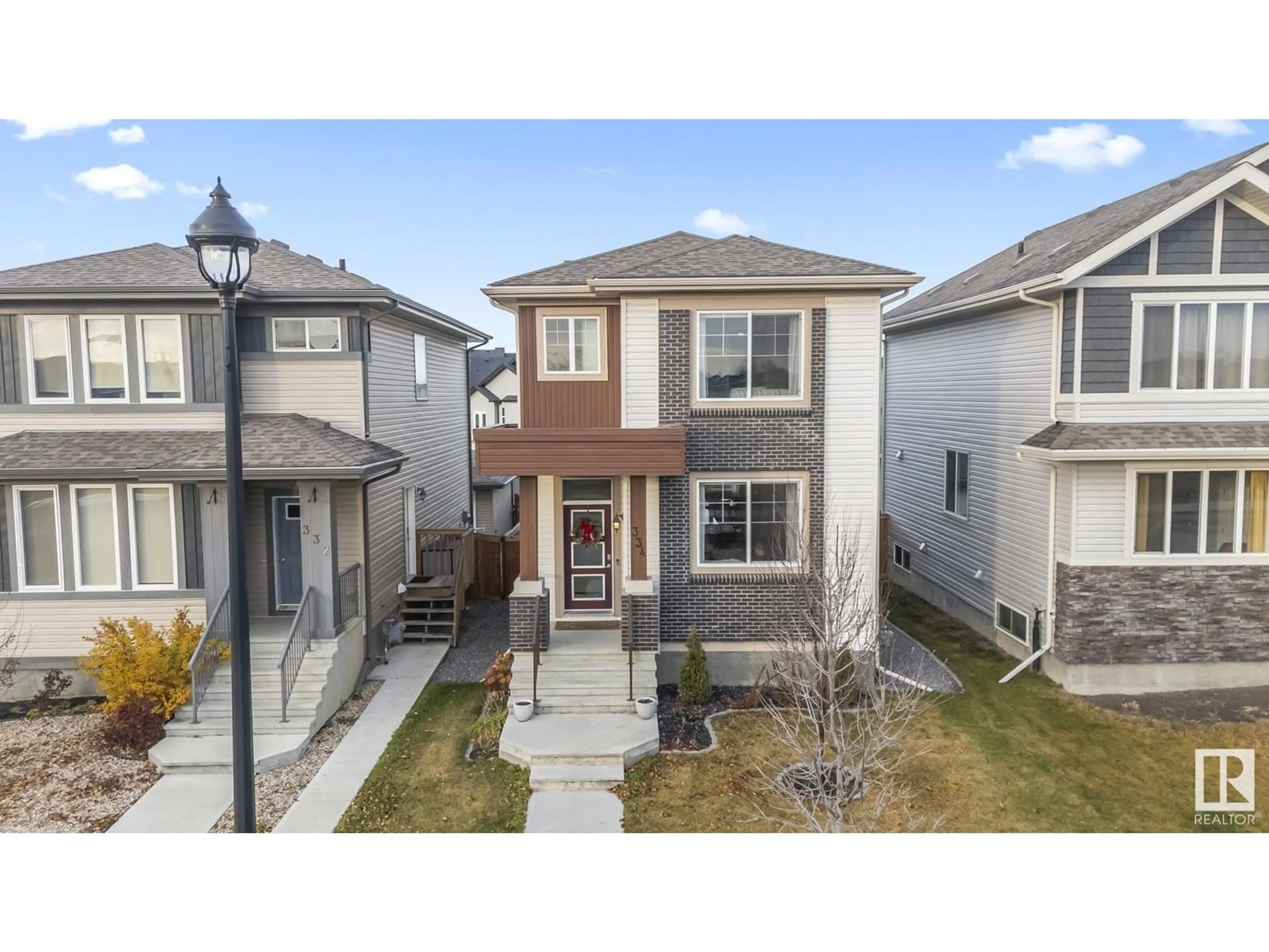 Frontside or backside of a home, the fenced backyard for 334 West Haven DR, Leduc Alberta T9E1J2