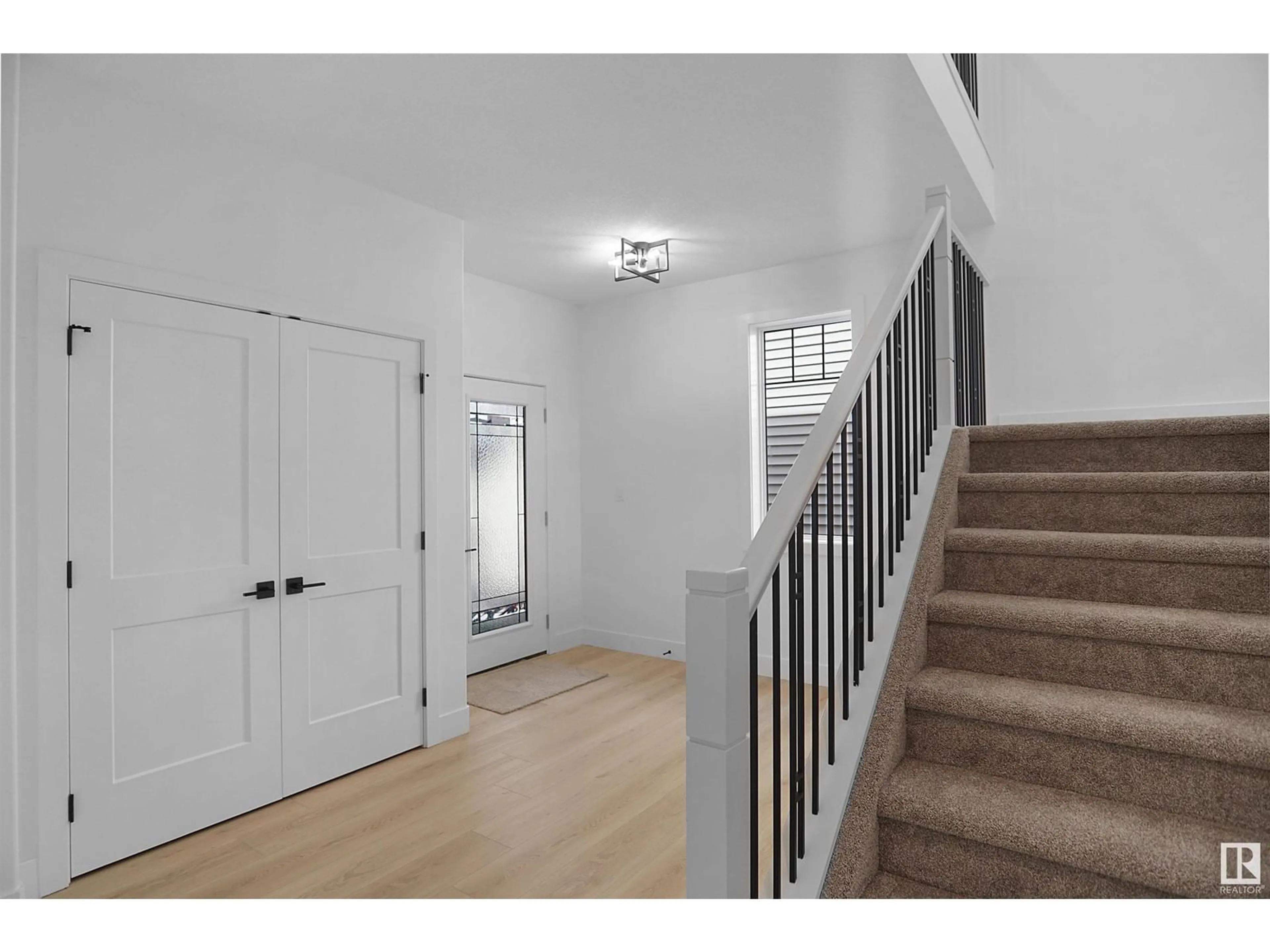 Indoor entryway, wood floors for 3616 6 ST NW, Edmonton Alberta T6T2L5