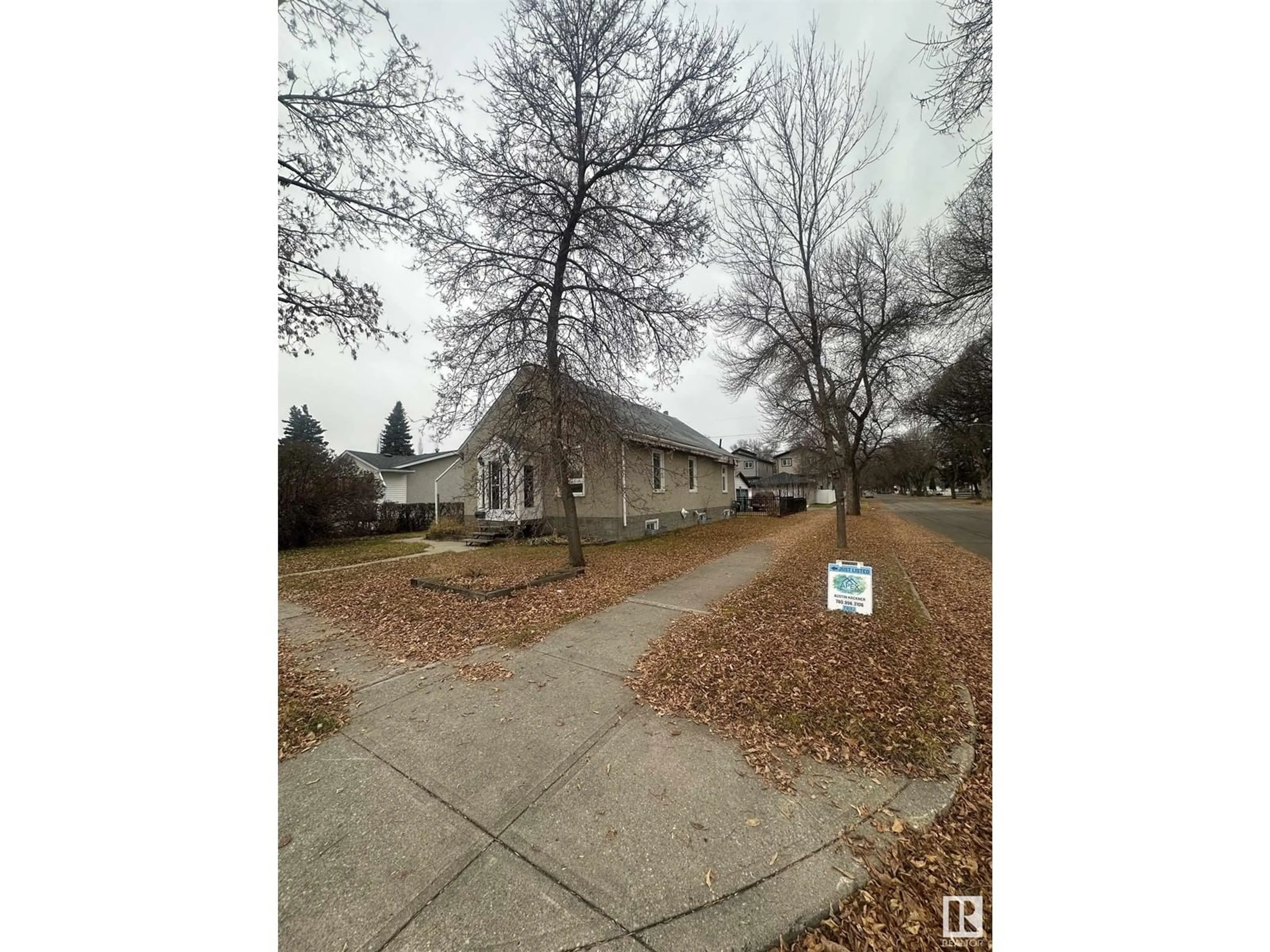 Frontside or backside of a home, the street view for 11942 37 ST NW, Edmonton Alberta T5W2C1