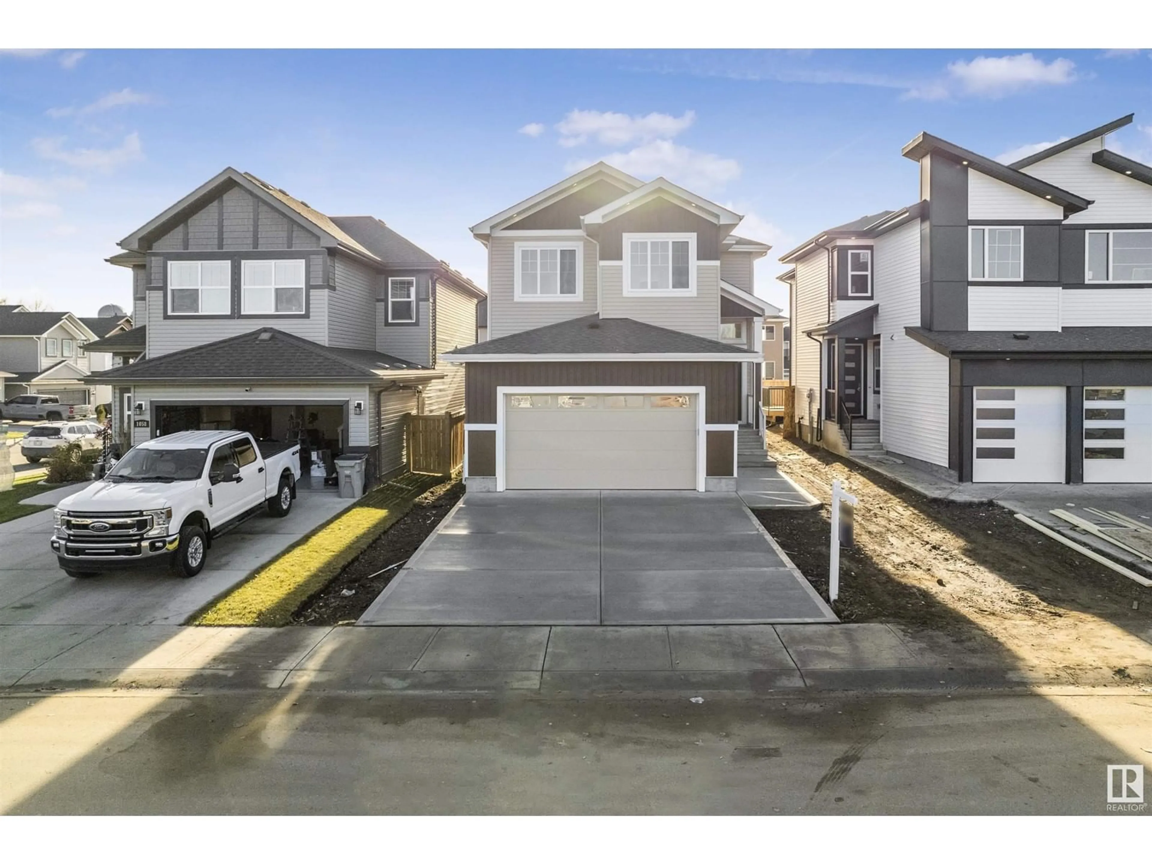 Frontside or backside of a home, the street view for 1056 SOUTH CREEK WD, Stony Plain Alberta T7Z0L9