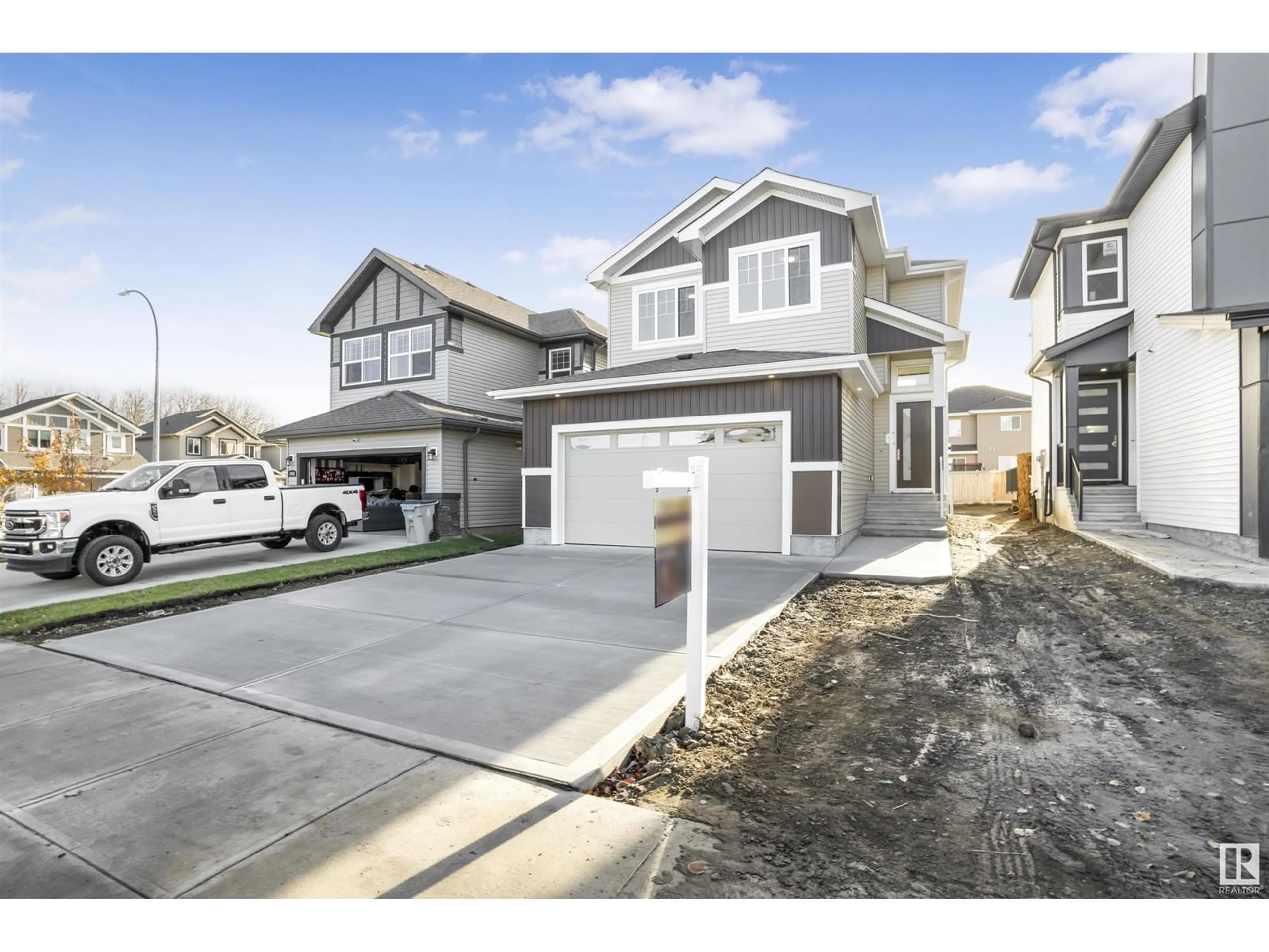 A pic from exterior of the house or condo, the street view for 1056 SOUTH CREEK WD, Stony Plain Alberta T7Z0L9