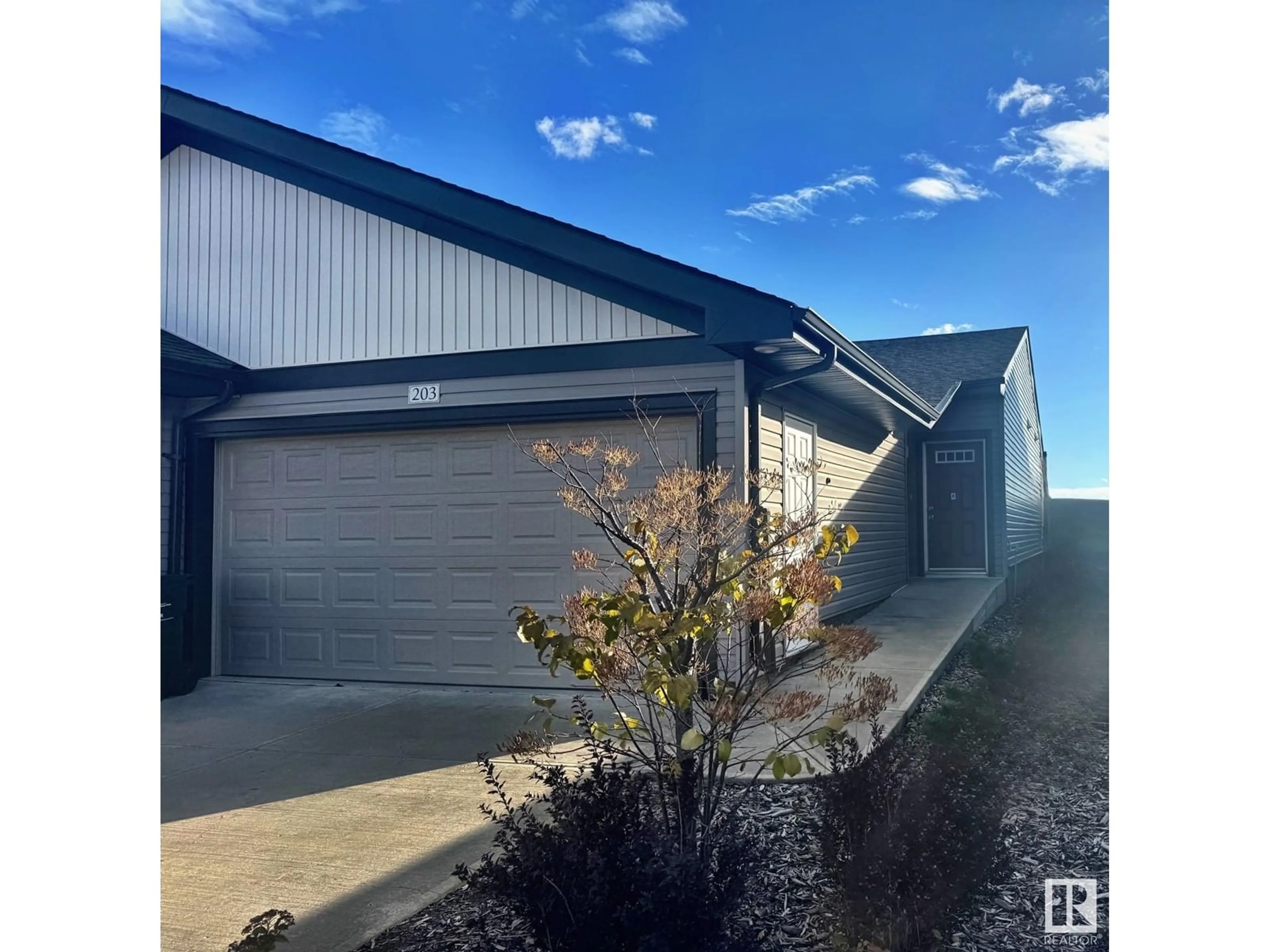 Frontside or backside of a home, the front or back of building for 203 BRICKYARD PL, Stony Plain Alberta T7Z0L1