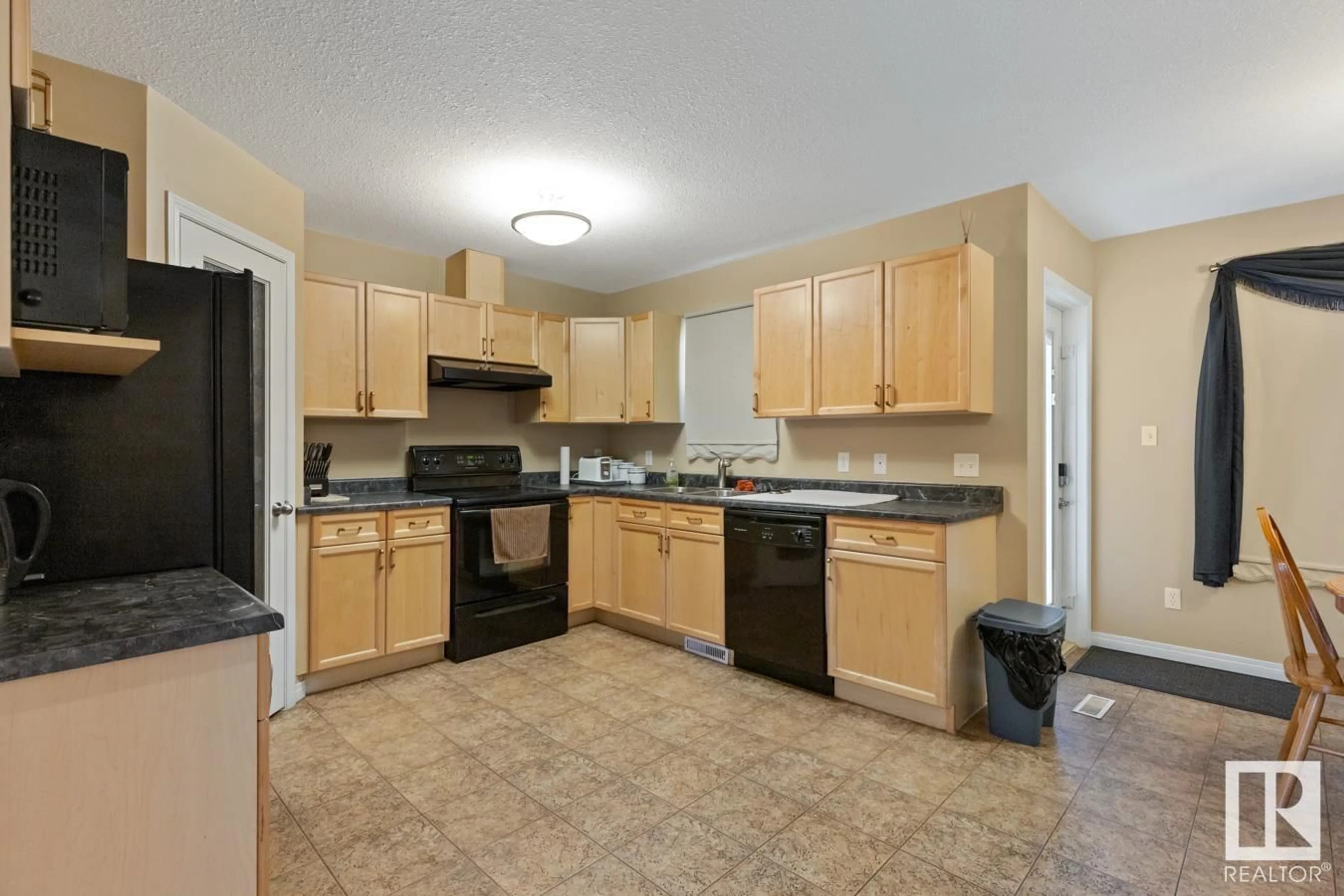 Standard kitchen, wood floors, cottage for #114 178 BRIDGEPORT BV, Leduc Alberta T9E8S8