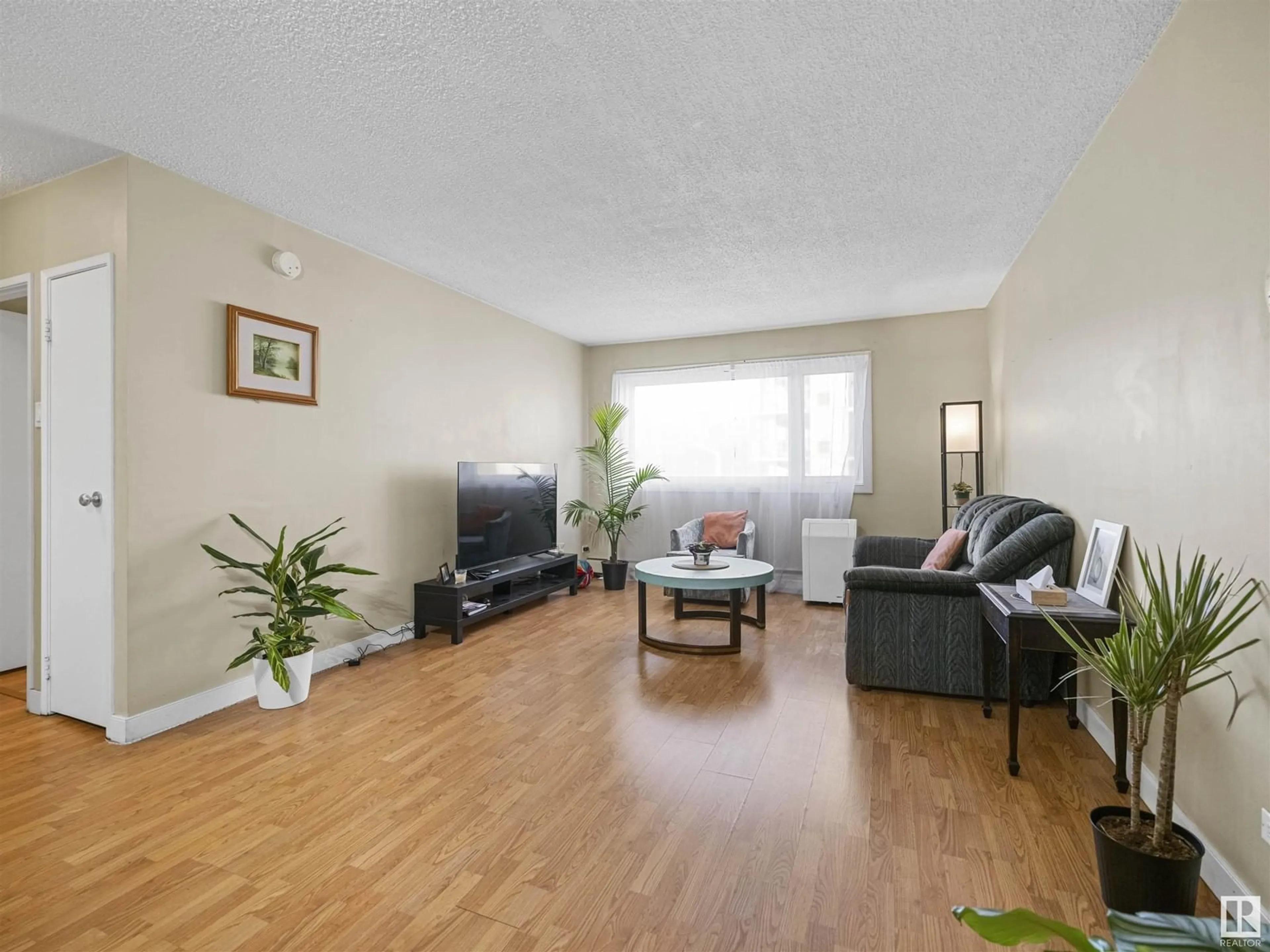 A pic of a room, wood floors for #409 9710 105 ST NW, Edmonton Alberta T5K1A4